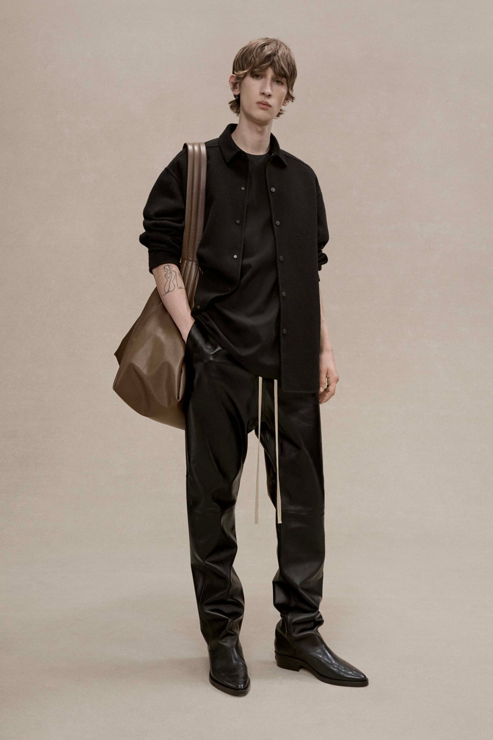 black relaxed wool jacket with leather pants