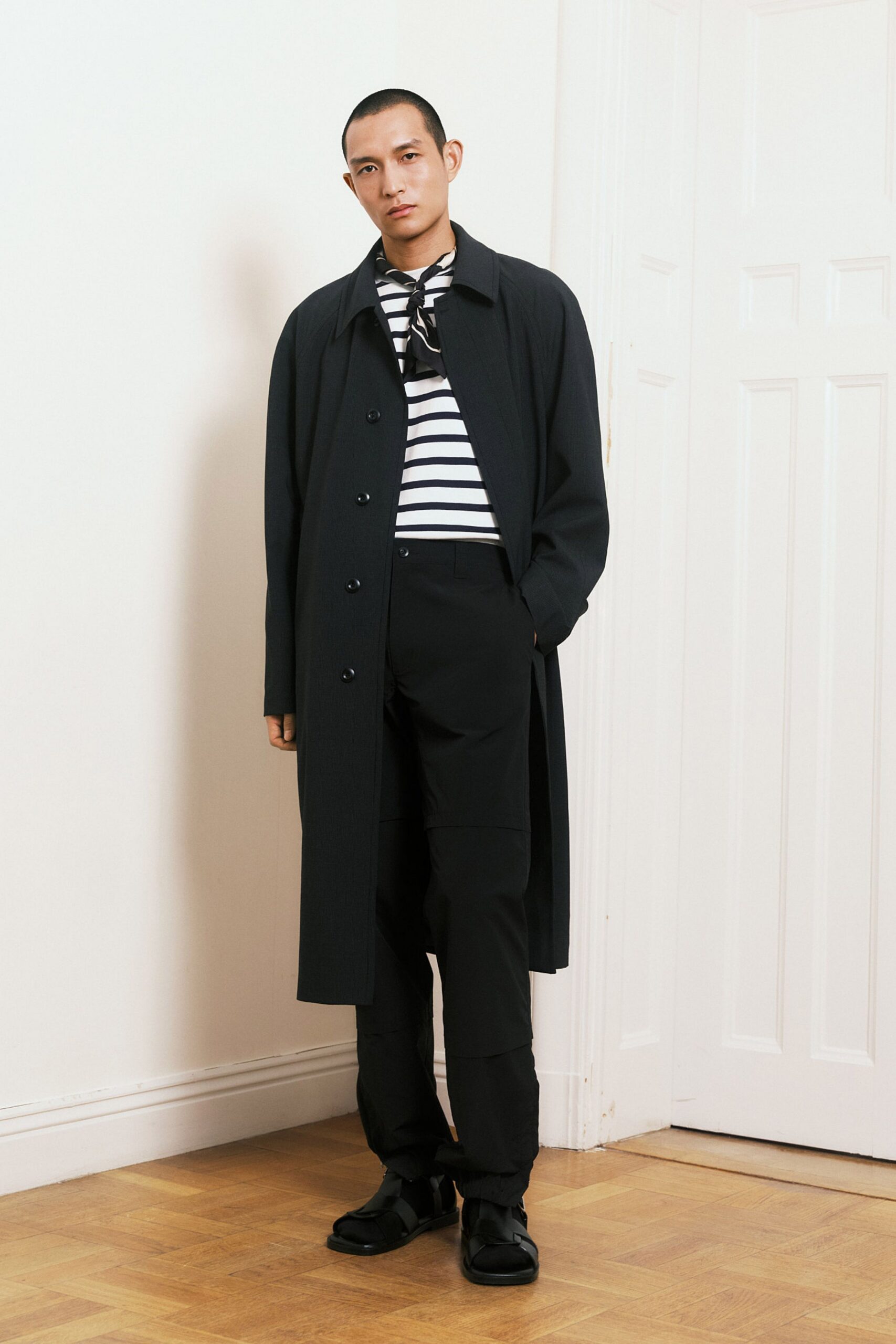 black coat with striped shirt