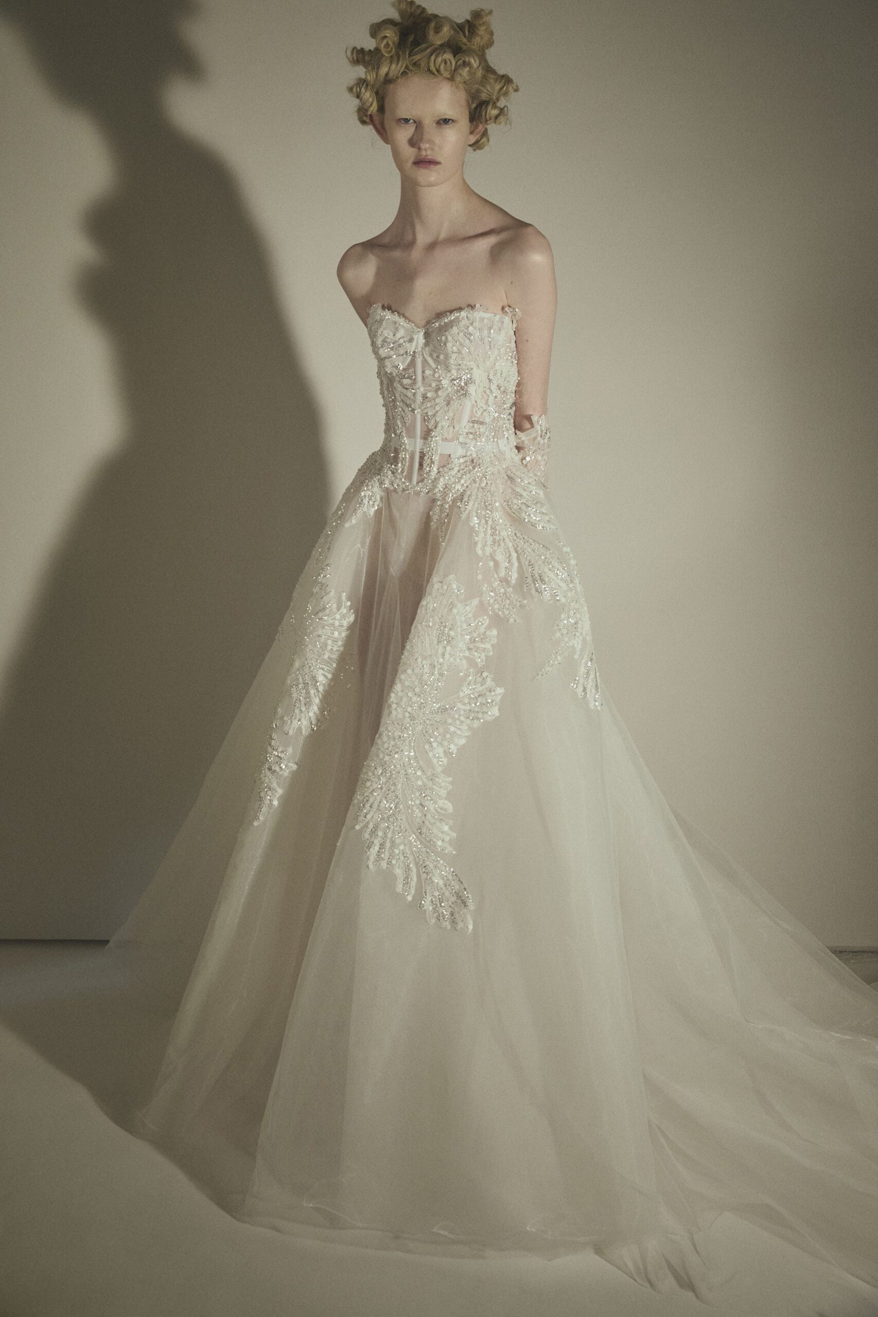 white embroidered strapless gown