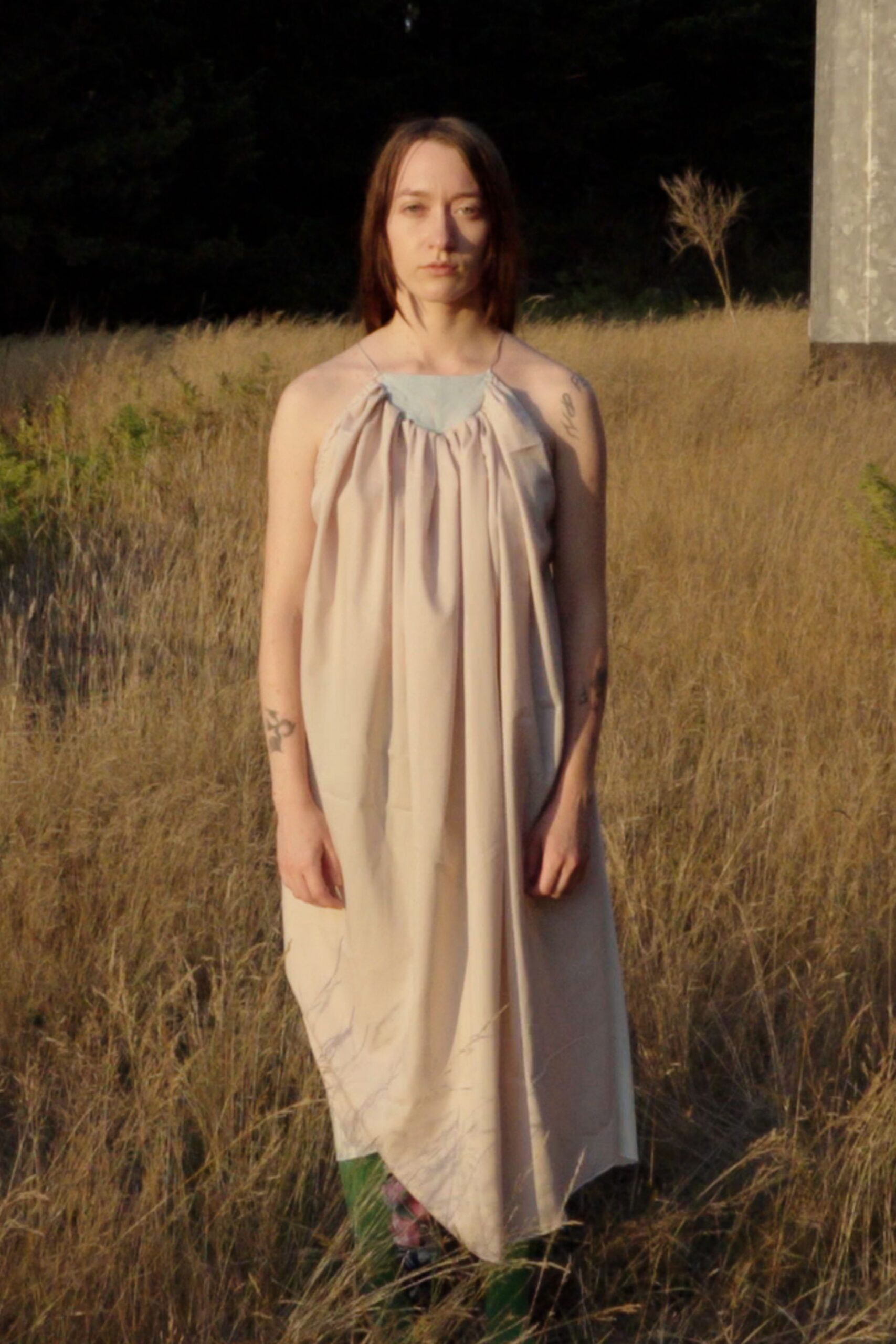 beige silk sleeveless dress