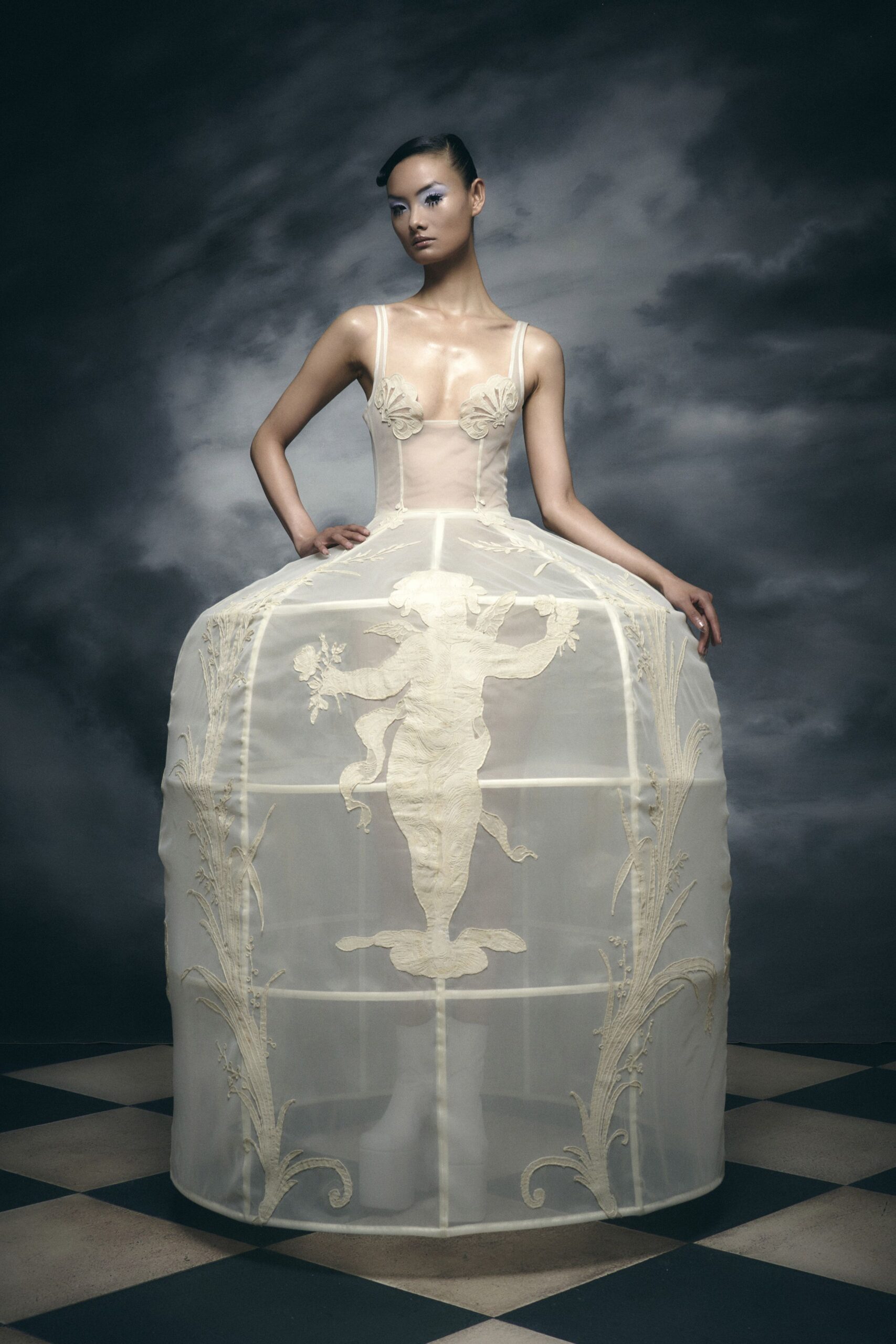 white silk embroidered gown
