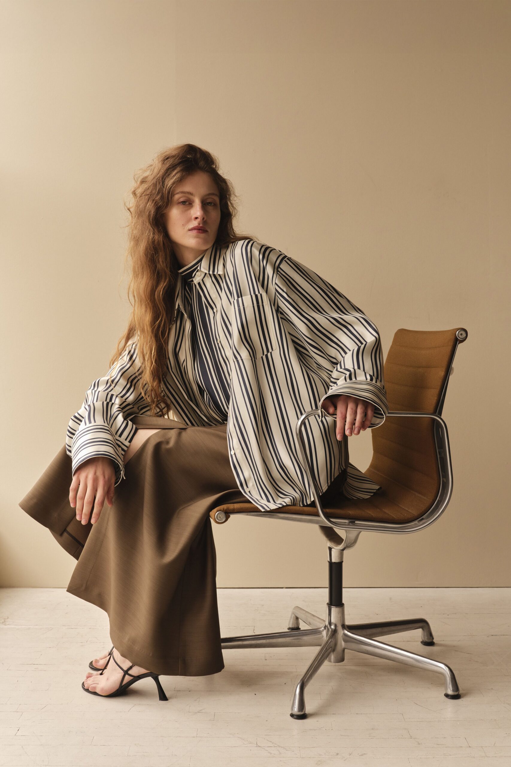 oversized striped shirt and brown midi skirt