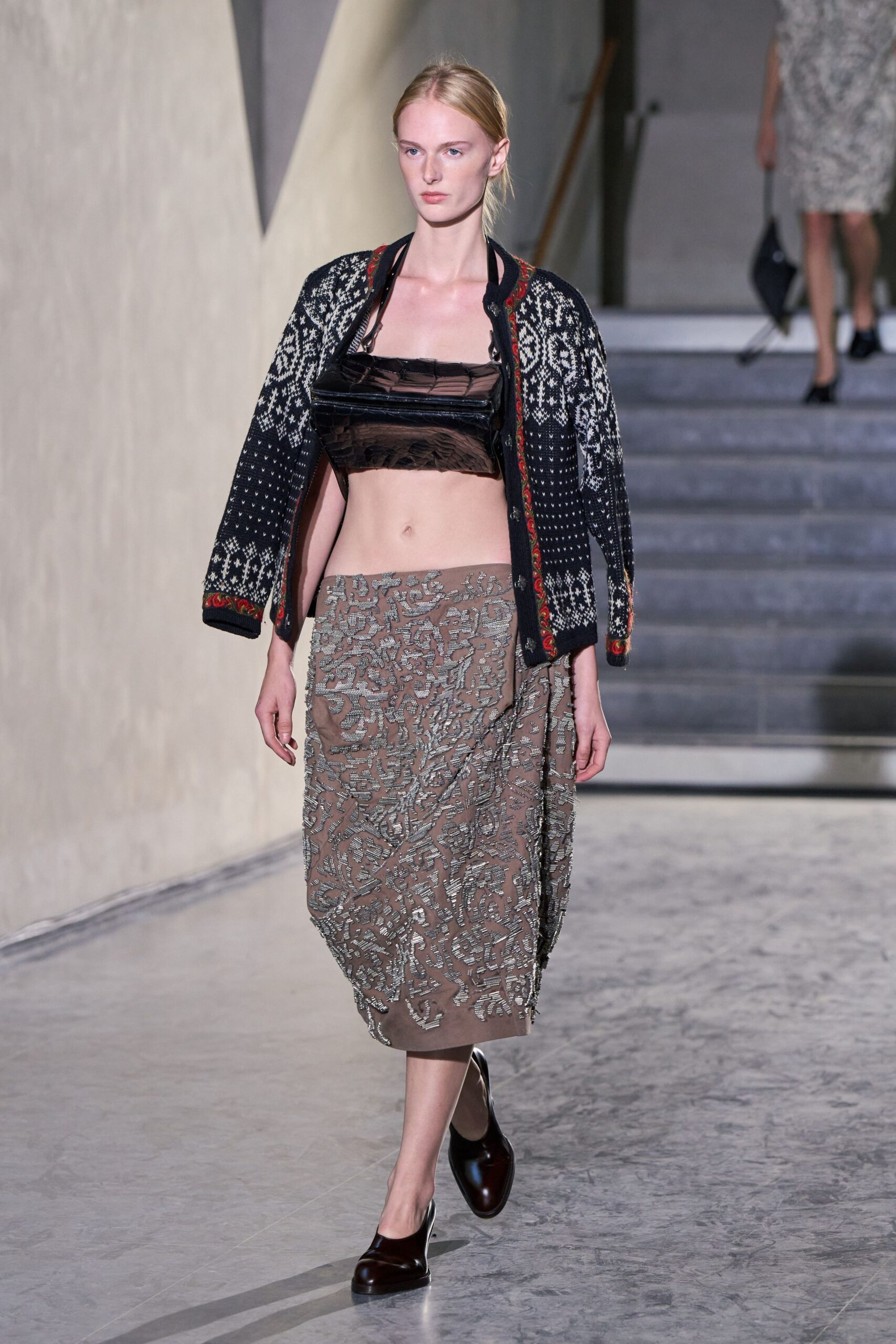black embroidered jacket with silk top and skirt