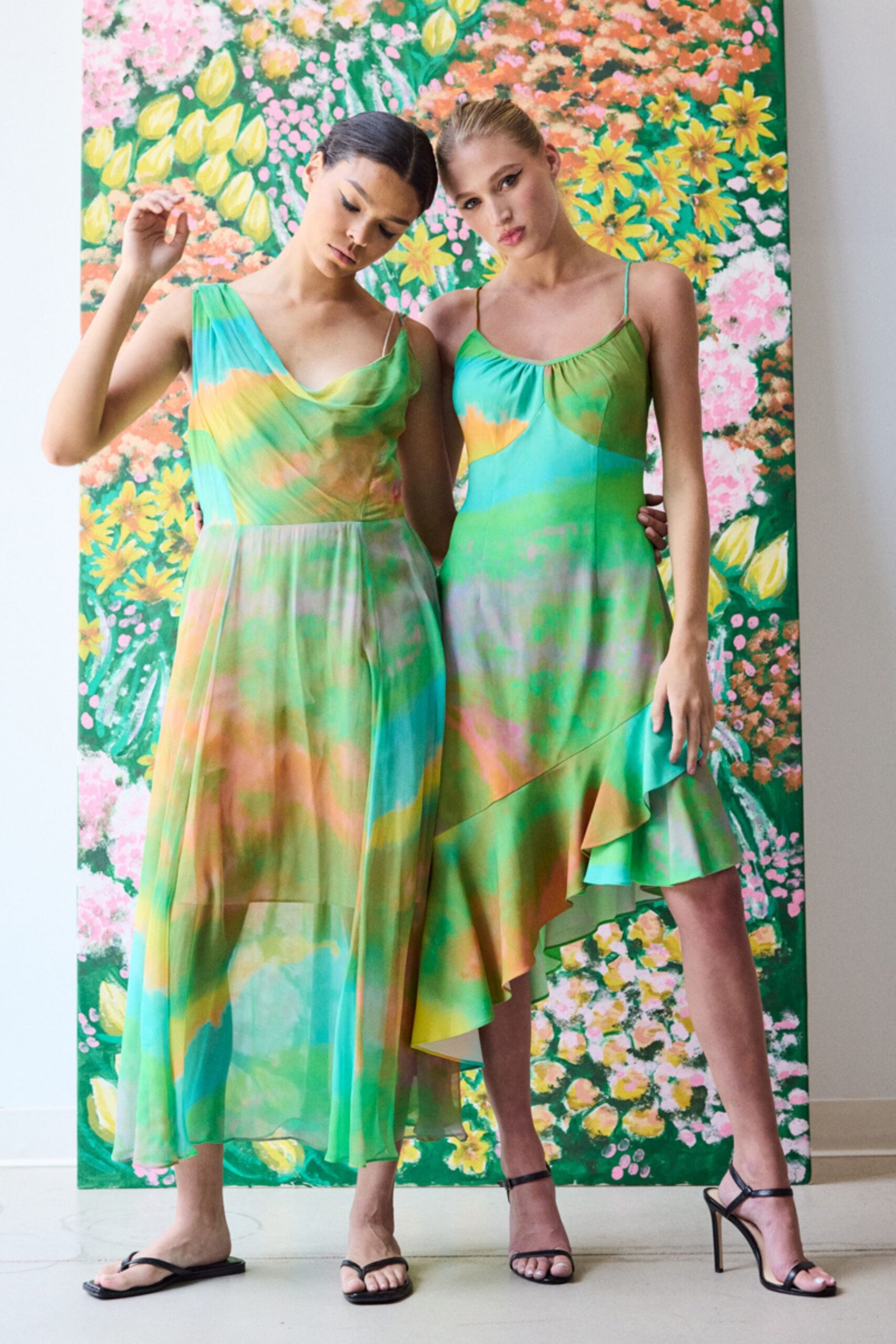 green silk sleeveless v-neck fitted draped tiered gown