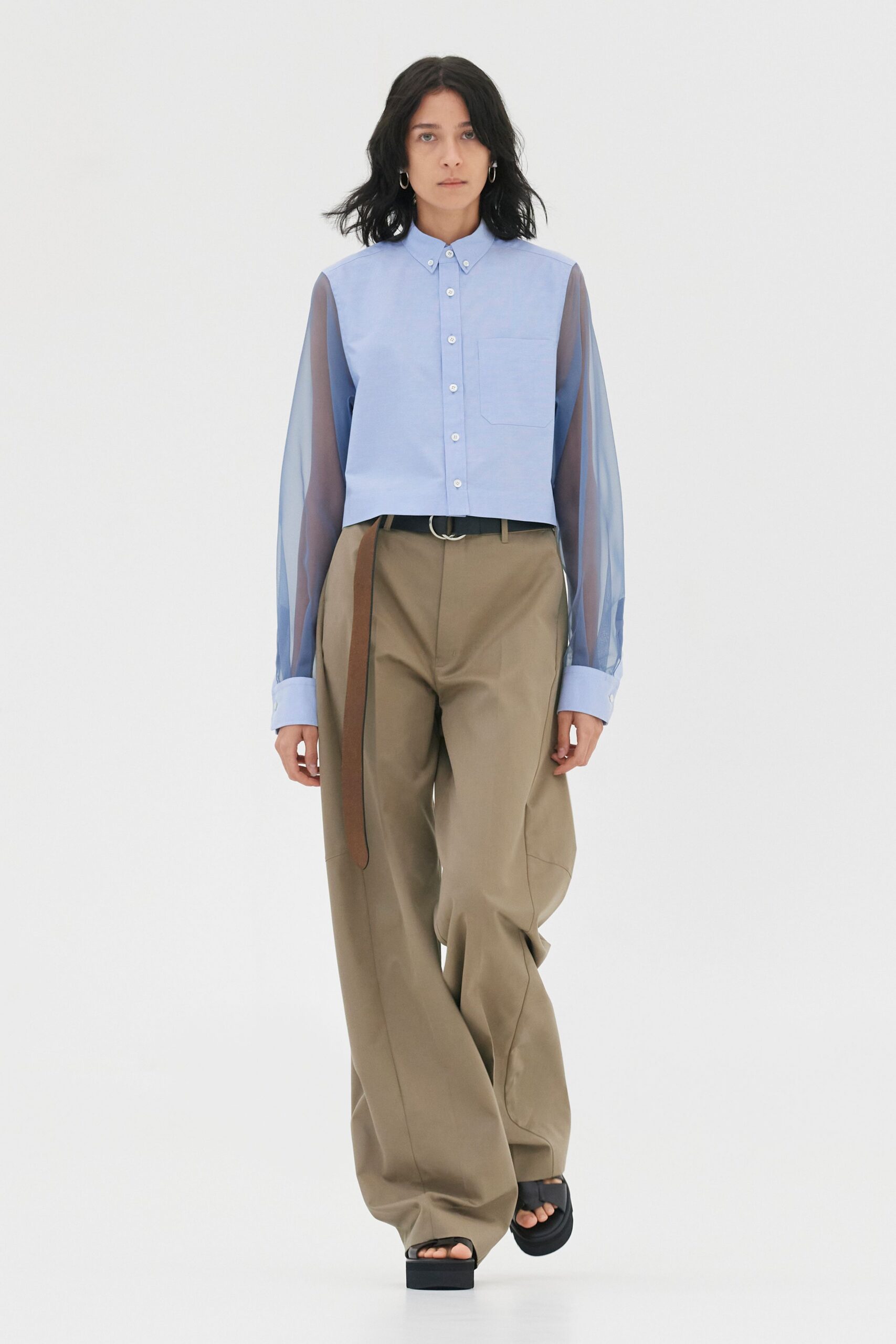 blue fitted shirt beige relaxed pants