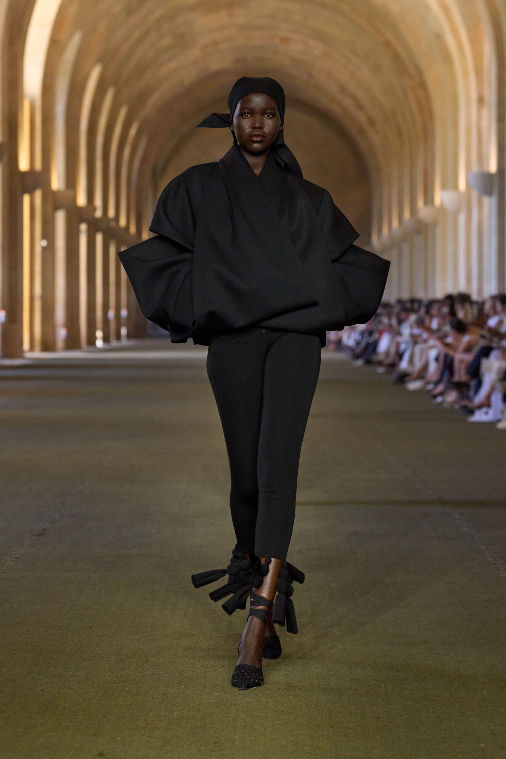 black relaxed top with fitted pants