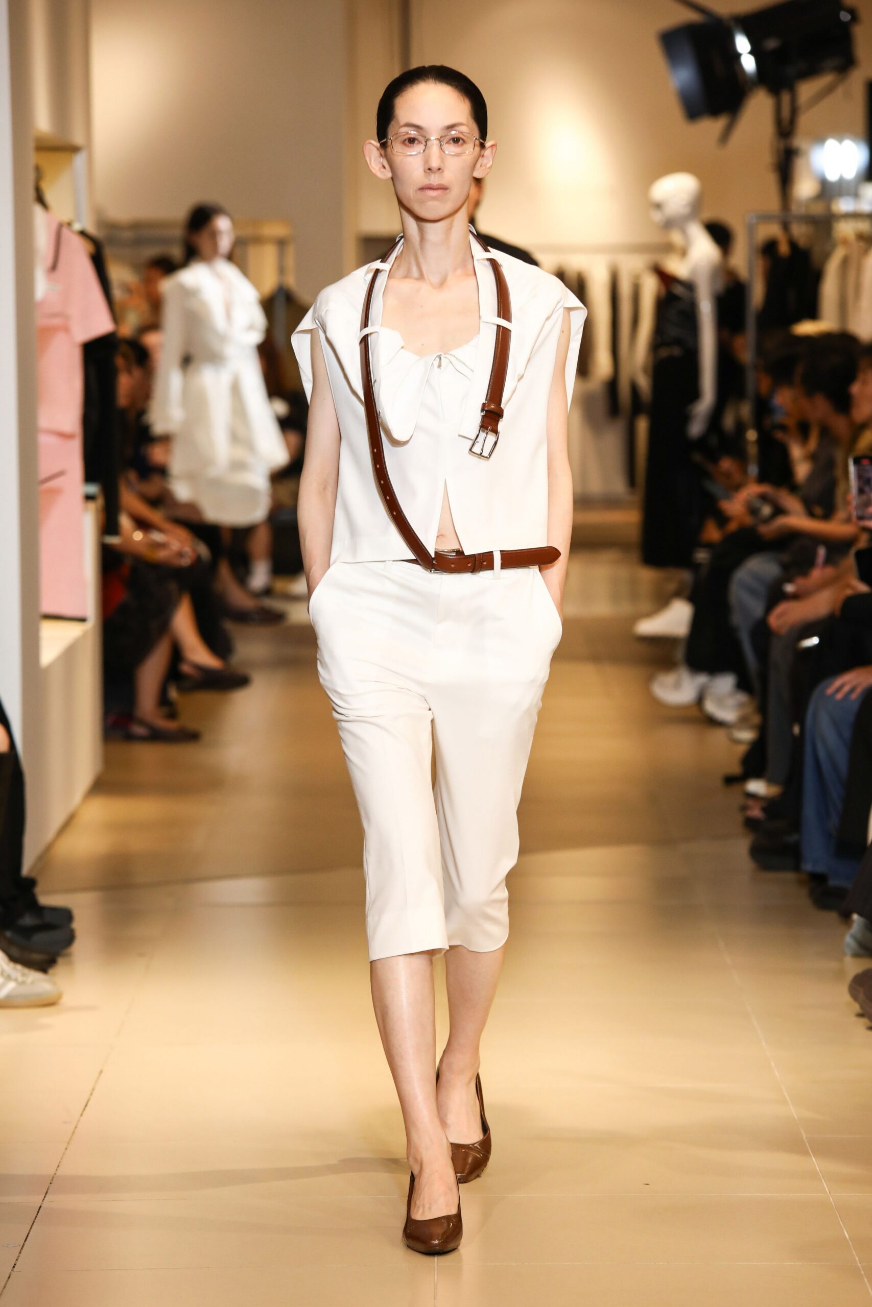 white cotton short-sleeve collared fitted zippered belted jumpsuit