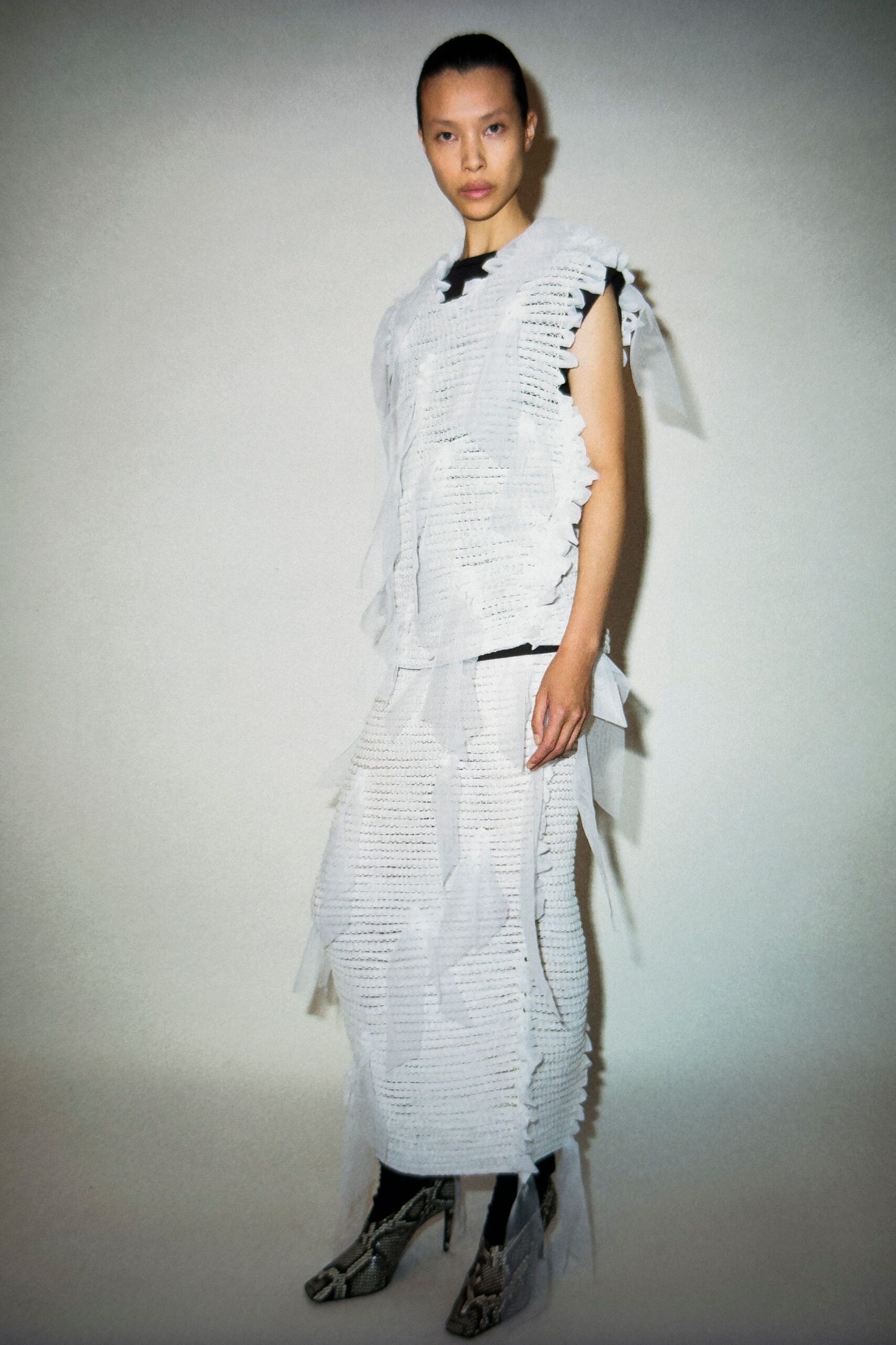 white fringed midi dress with snakeskin shoes