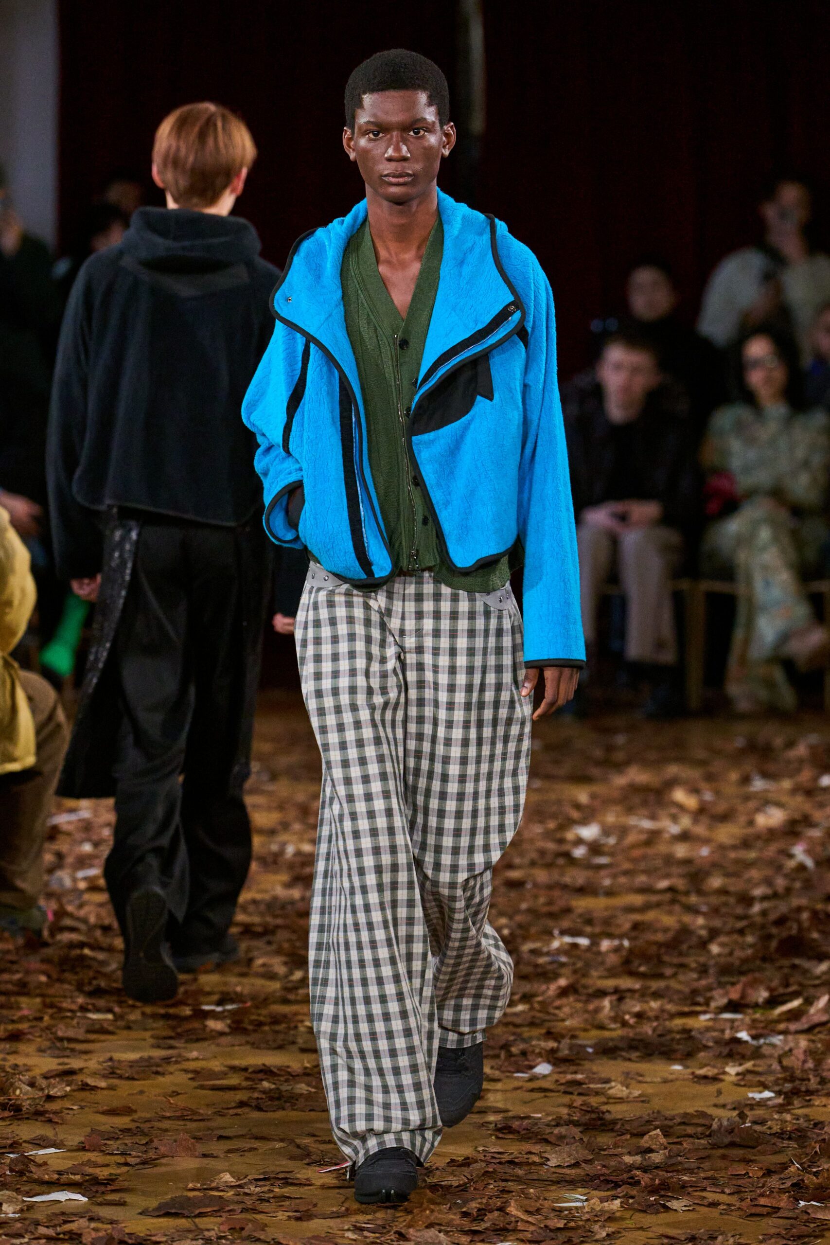 blue jacket green shirt checked pants