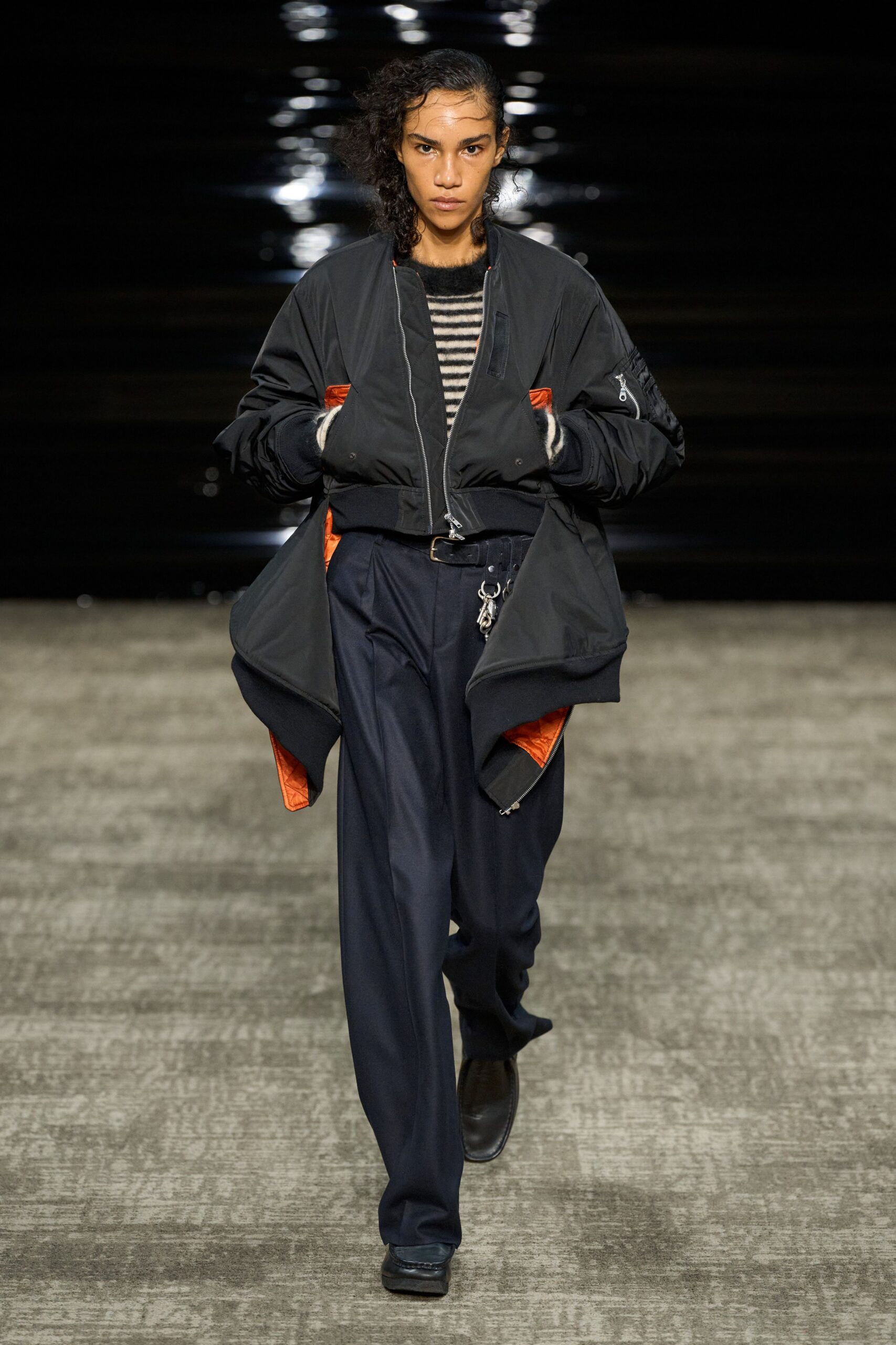black nylon jacket with striped top