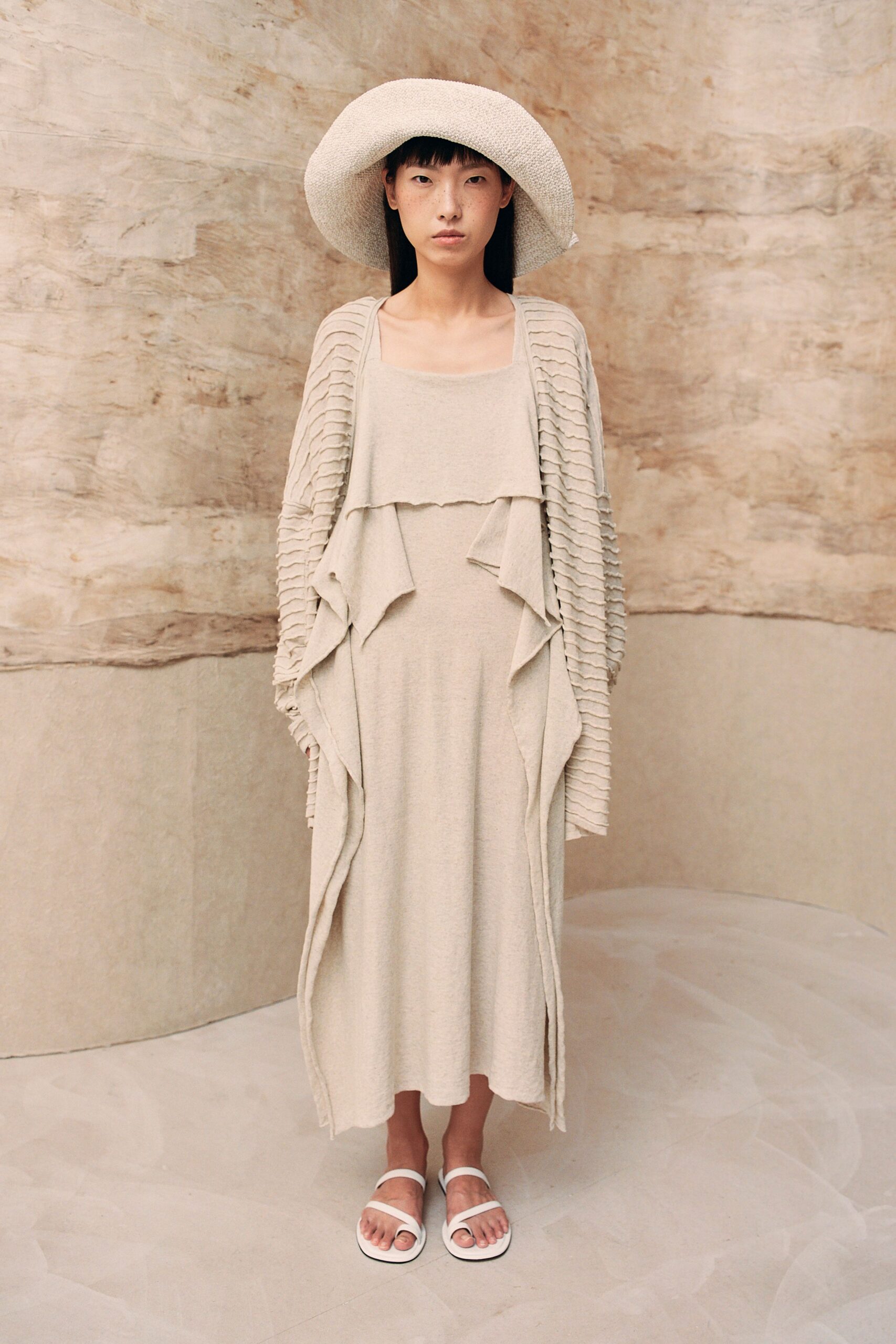 beige relaxed midi dress with layered coat