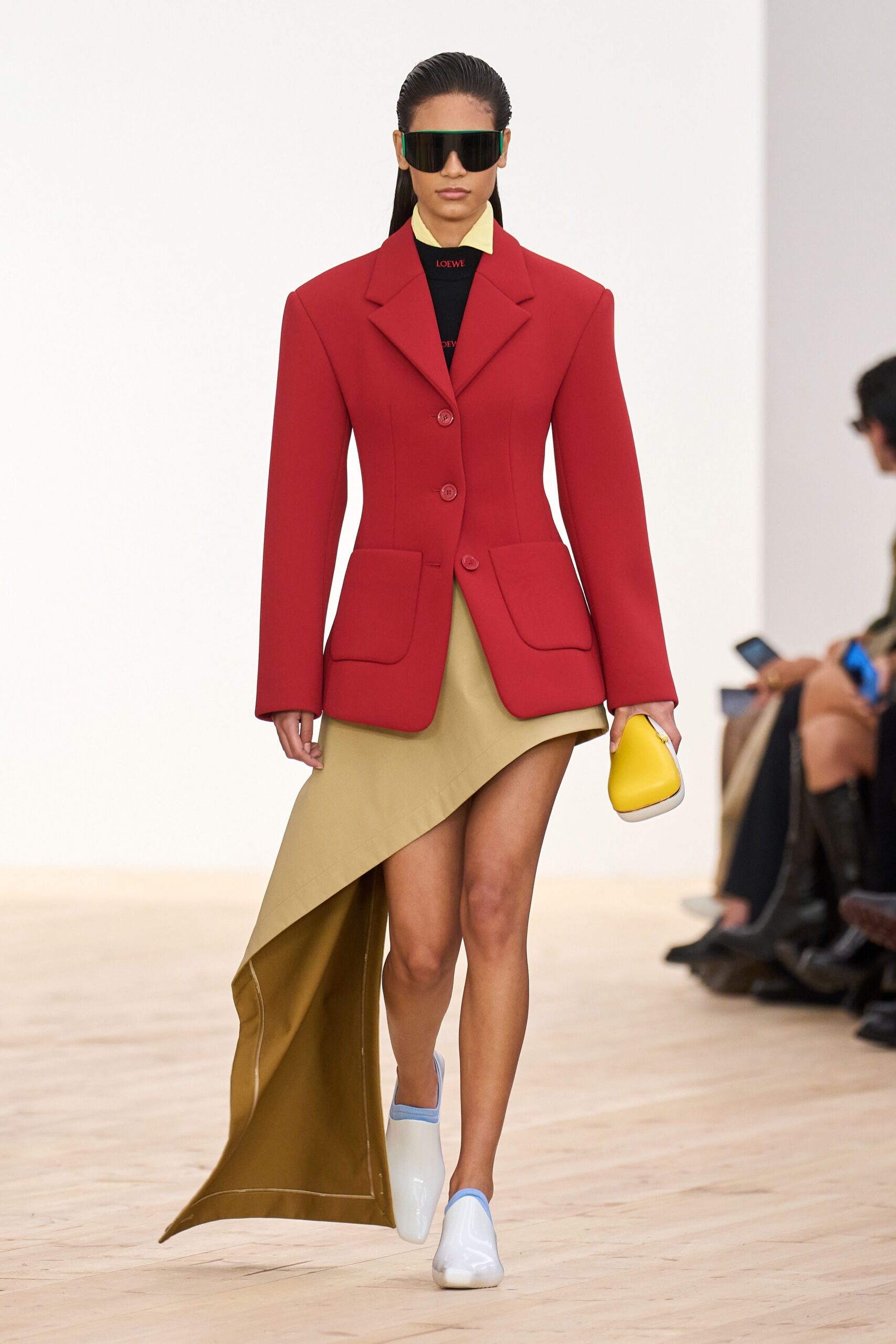 red blazer beige asymmetric skirt