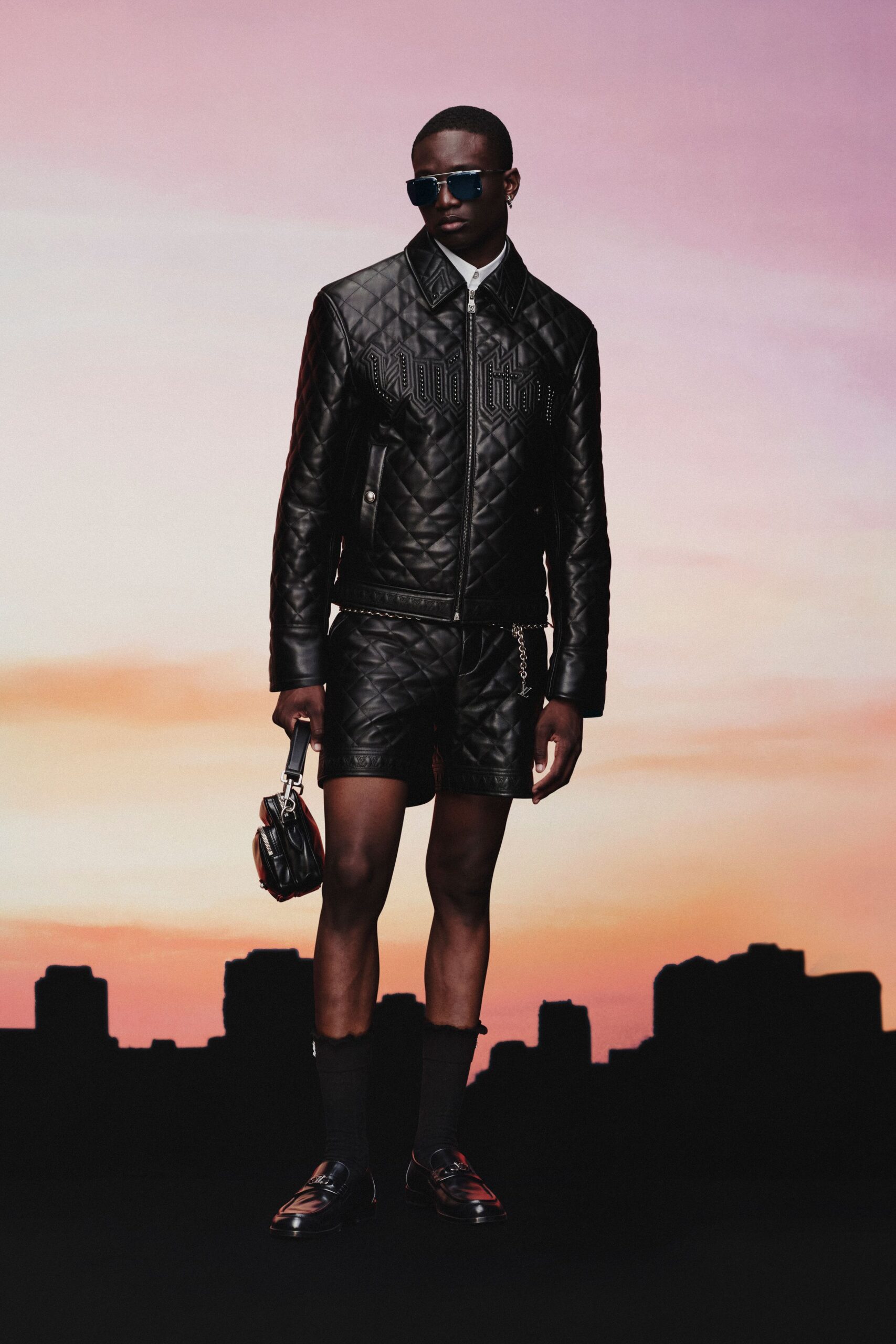 black leather jacket and shorts