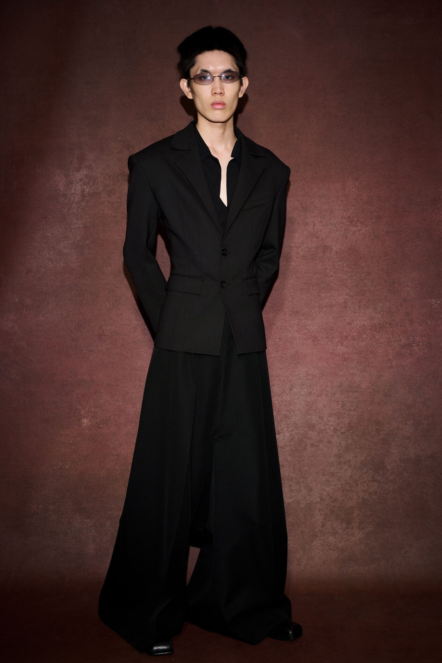 black tailored suit with wide-leg pants
