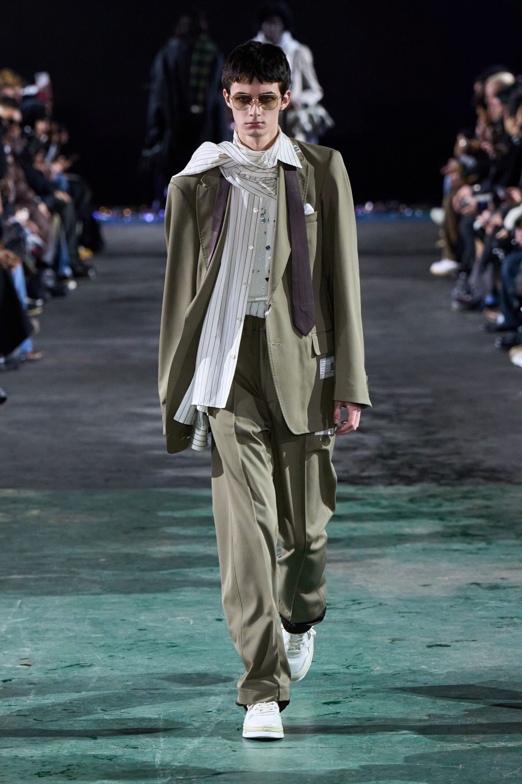 beige relaxed suit with white shirt