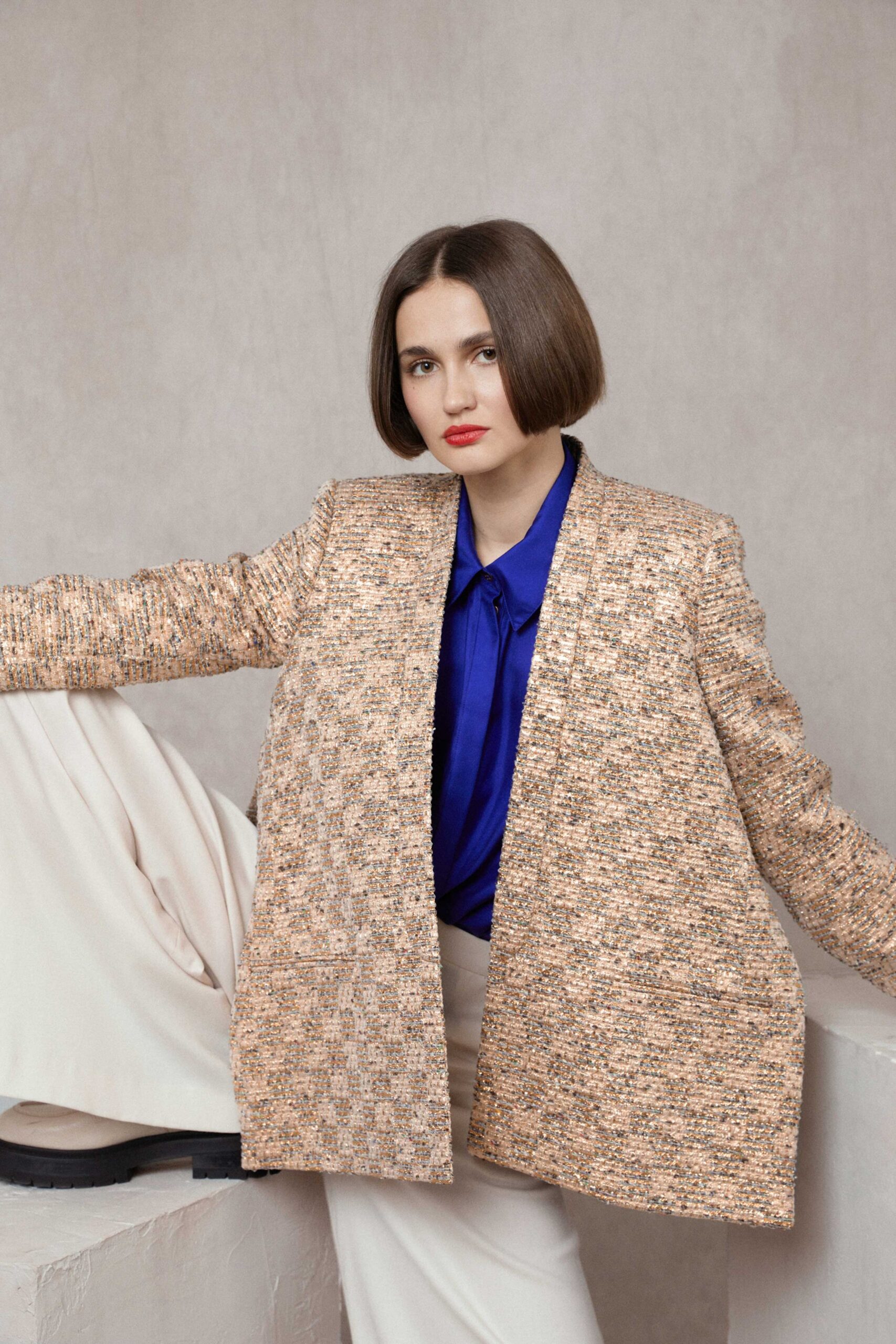 beige tweed blazer with blue shirt