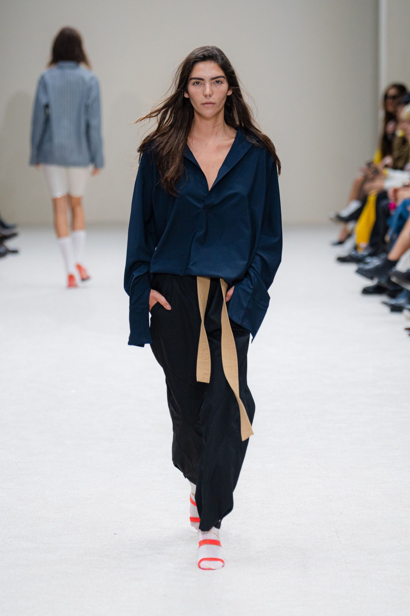 blue silk relaxed shirt with black pants