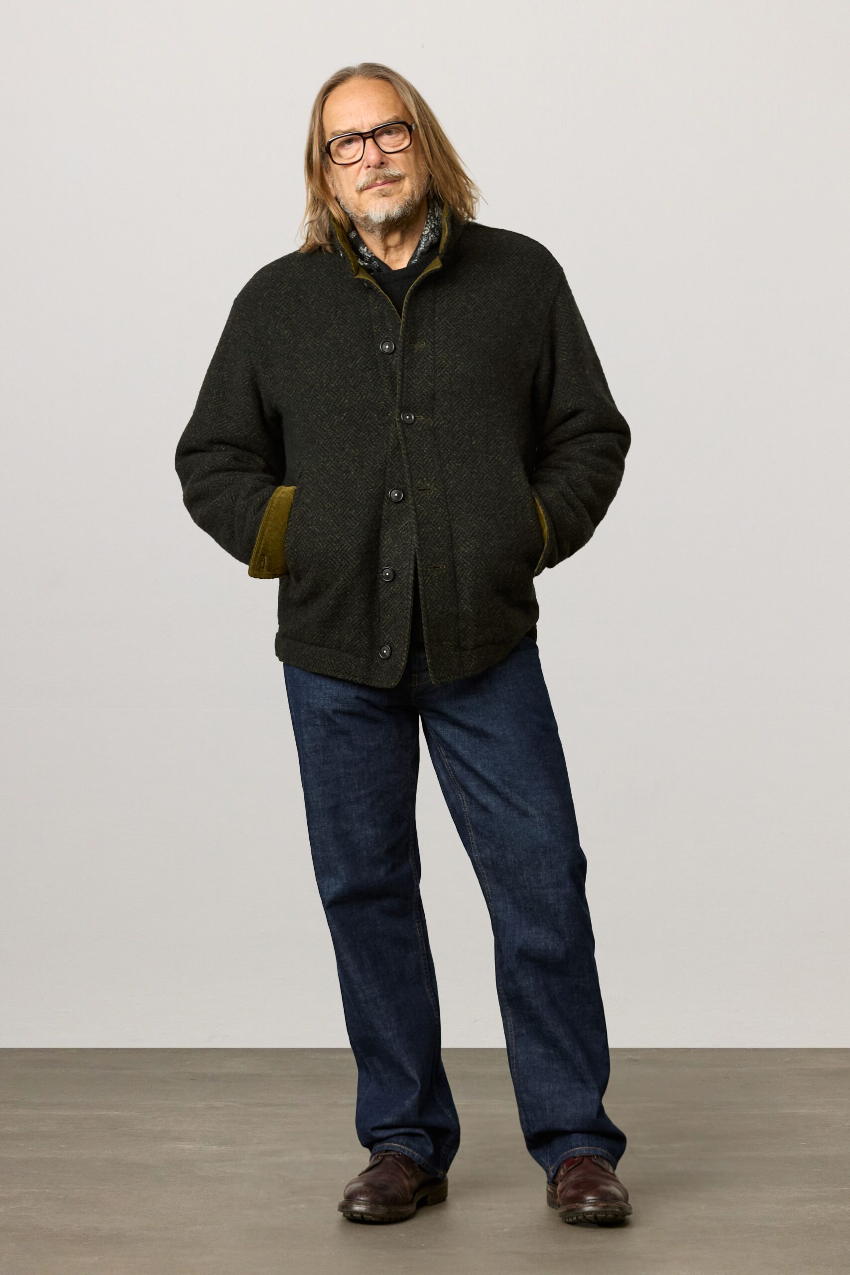 black wool jacket with blue shirt