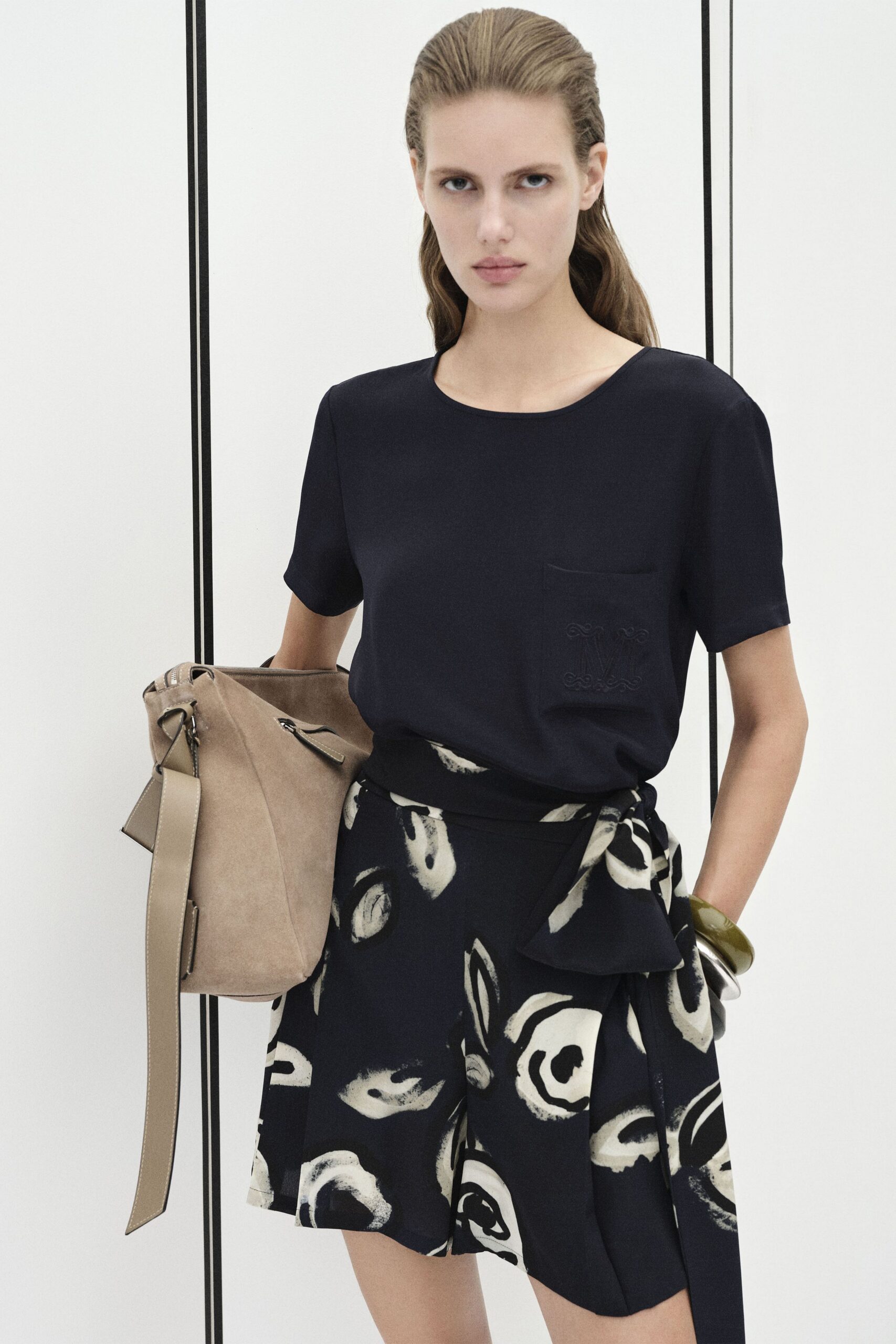 black fitted top with printed shorts