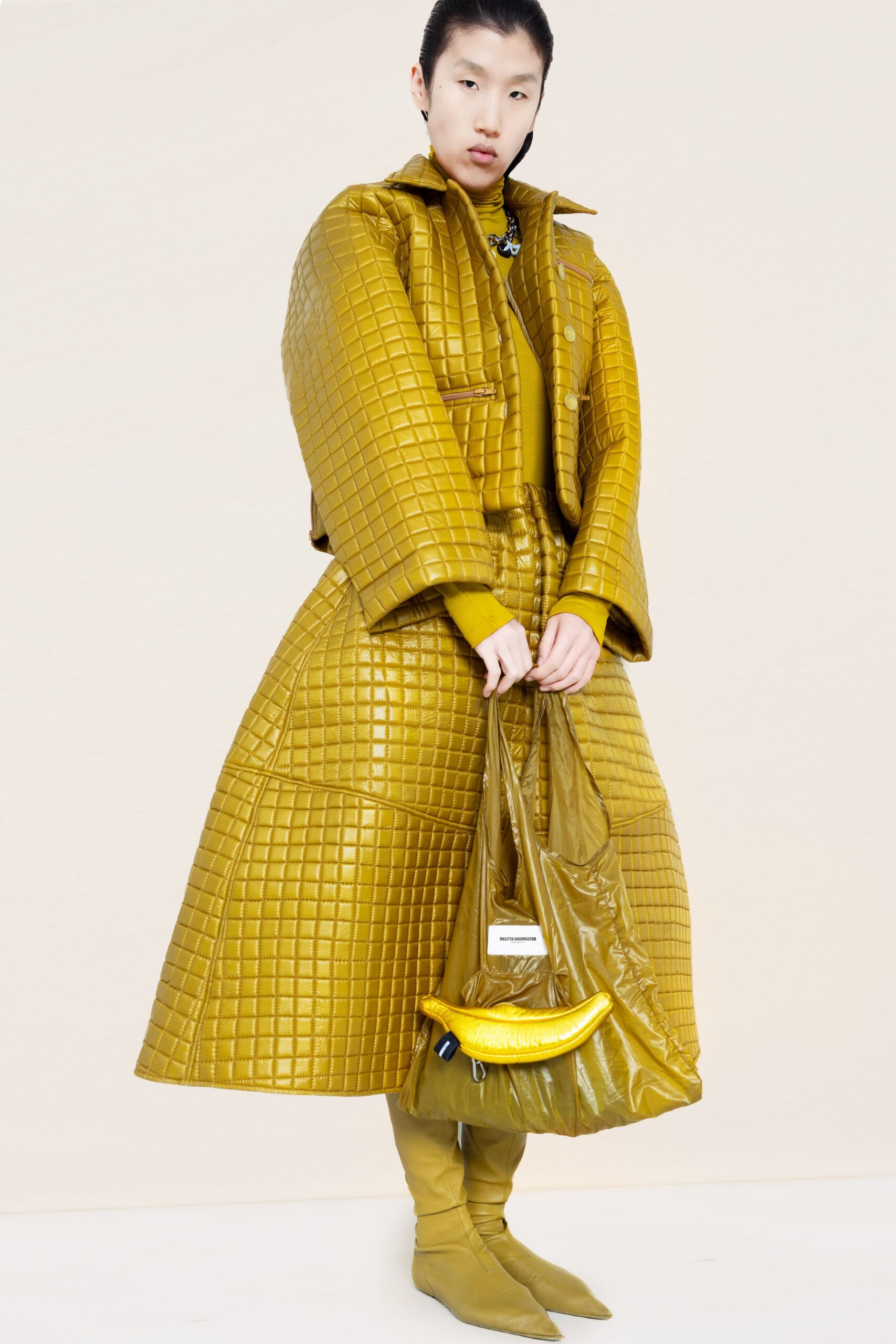 yellow vinyl long-sleeve collared oversized quilted midi coat
