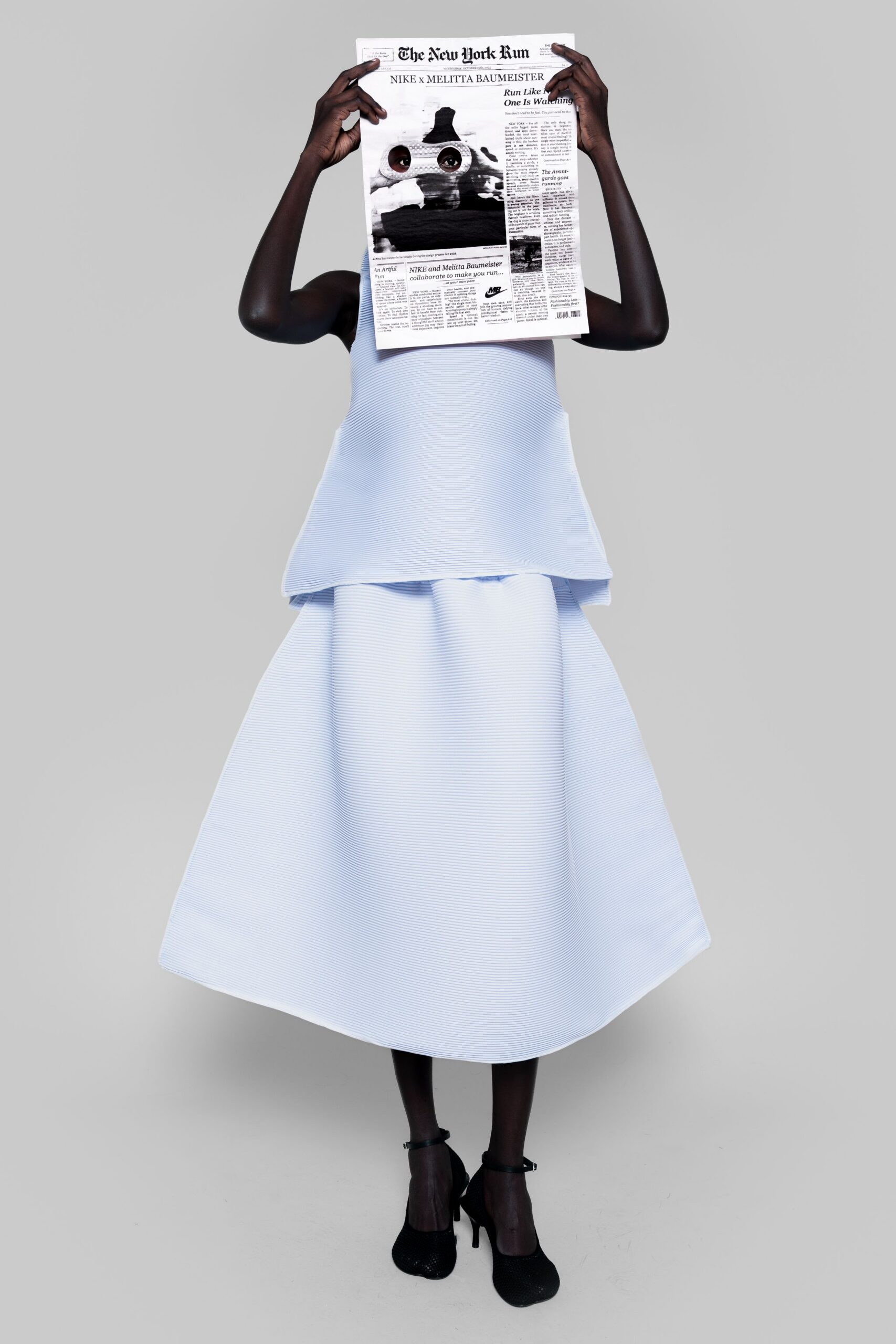 light blue layered midi dress with black shoes
