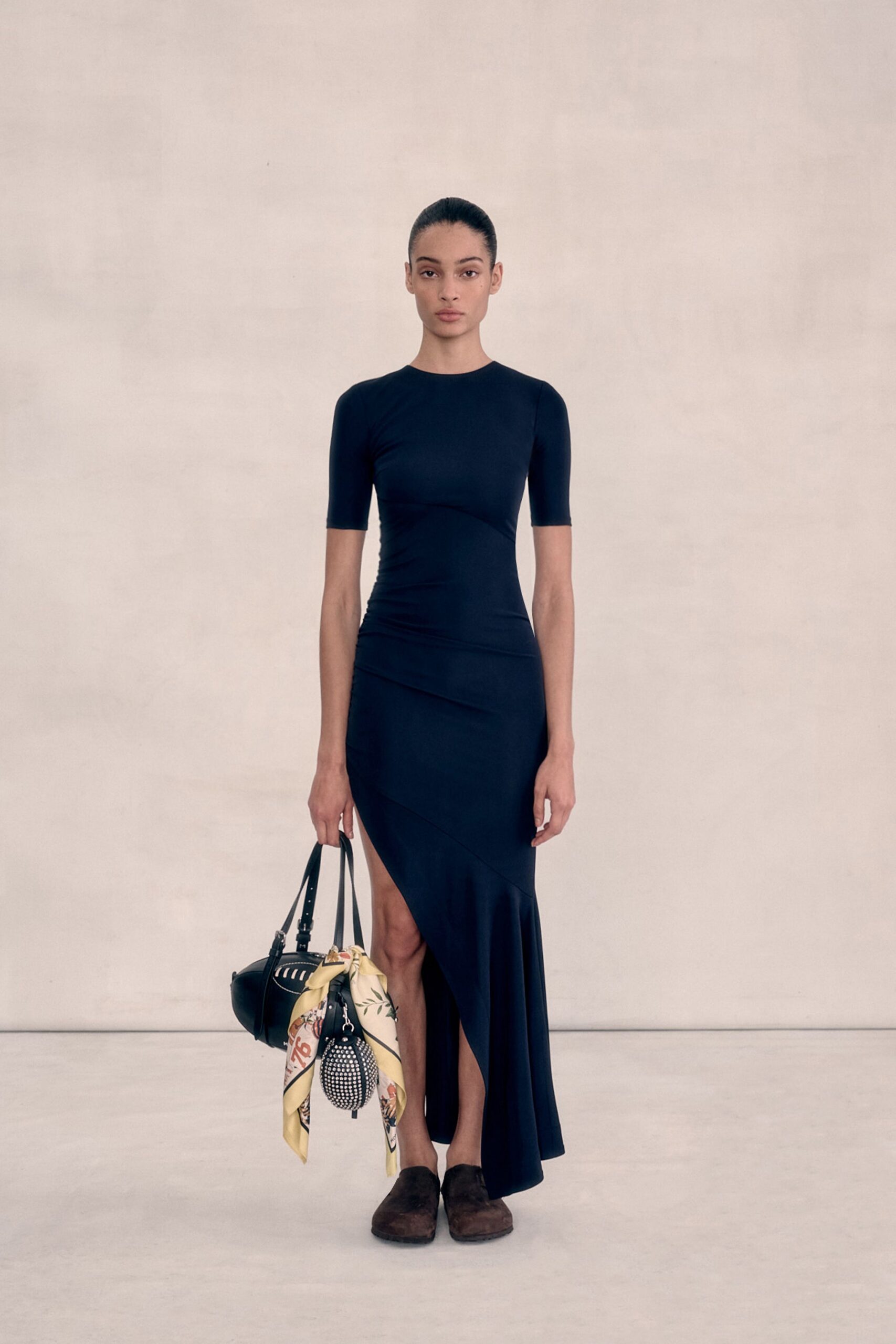 black fitted midi dress