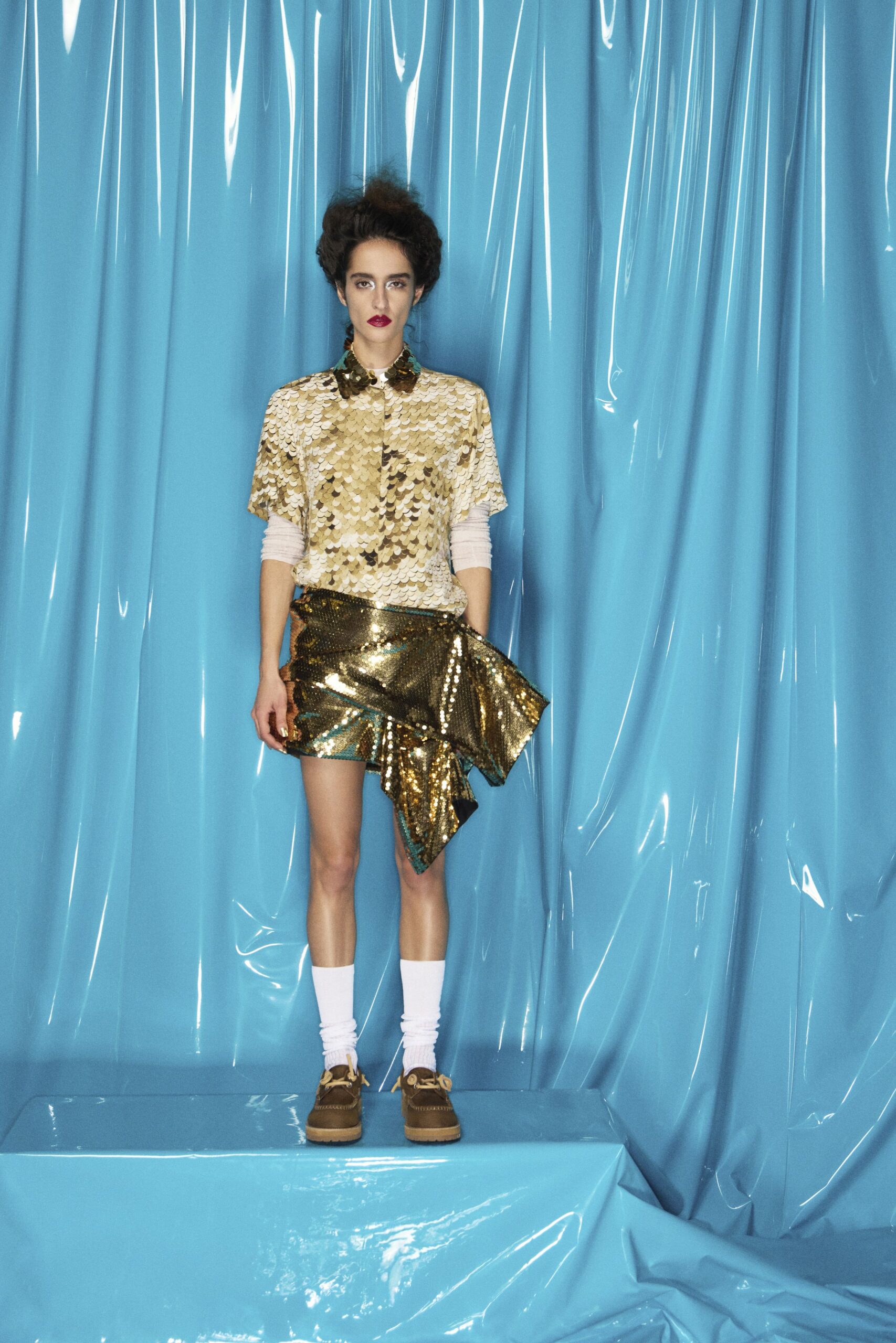 gold metallic asymmetric fitted shiny mini skirt