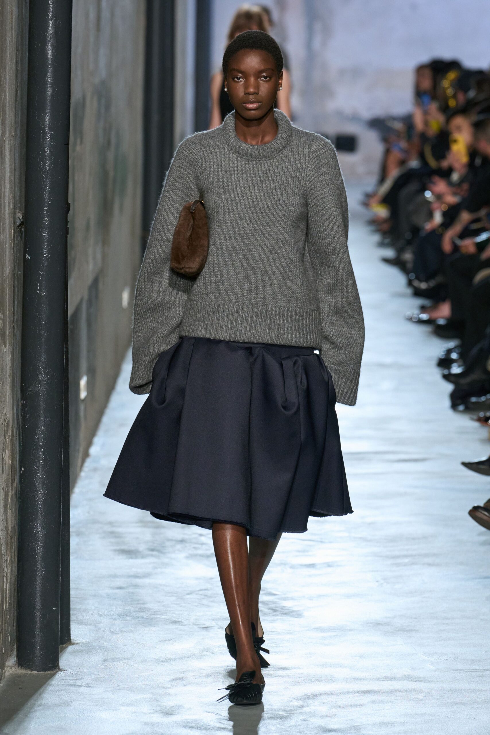 gray sweater navy pleated skirt