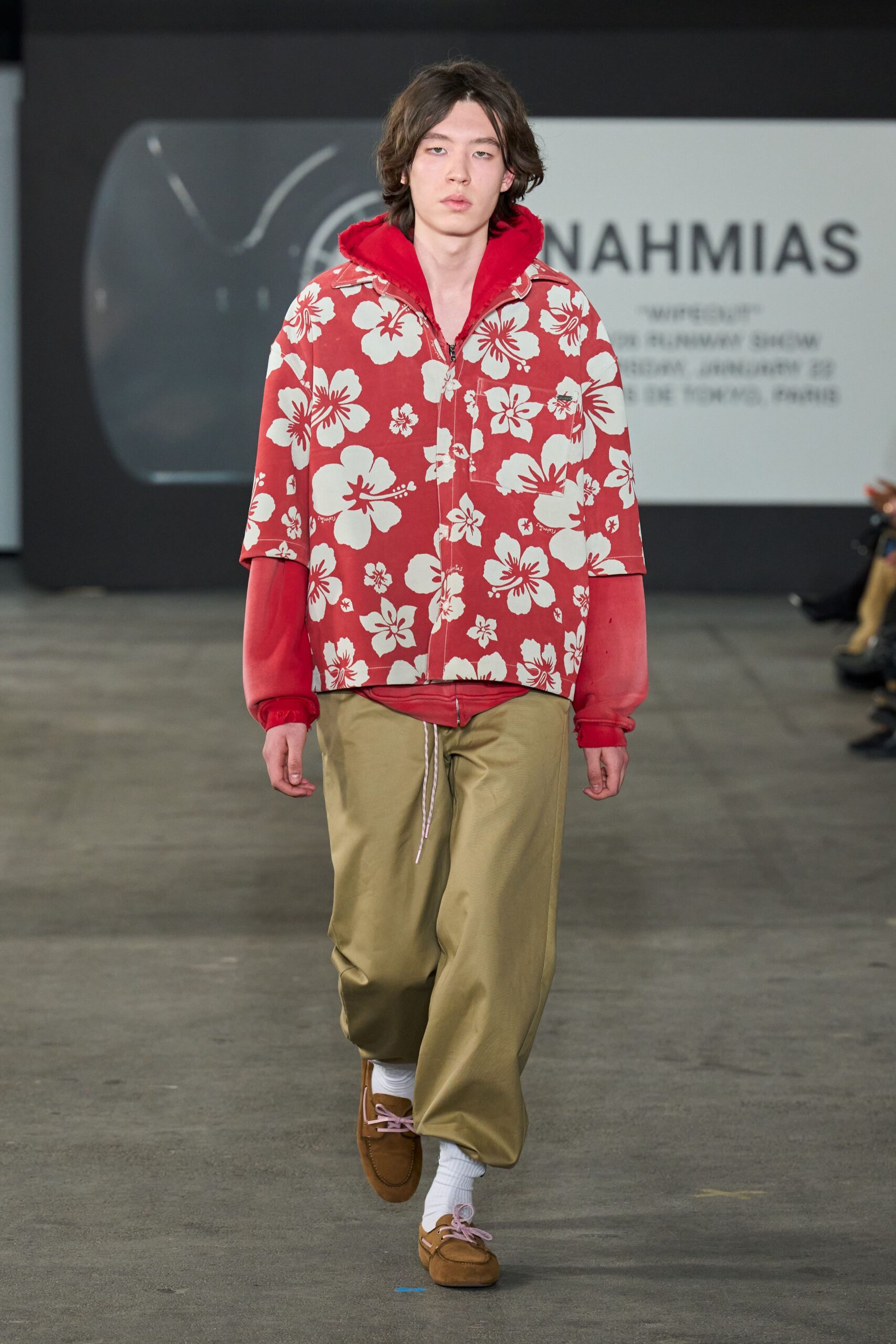 red floral hoodie with beige pants