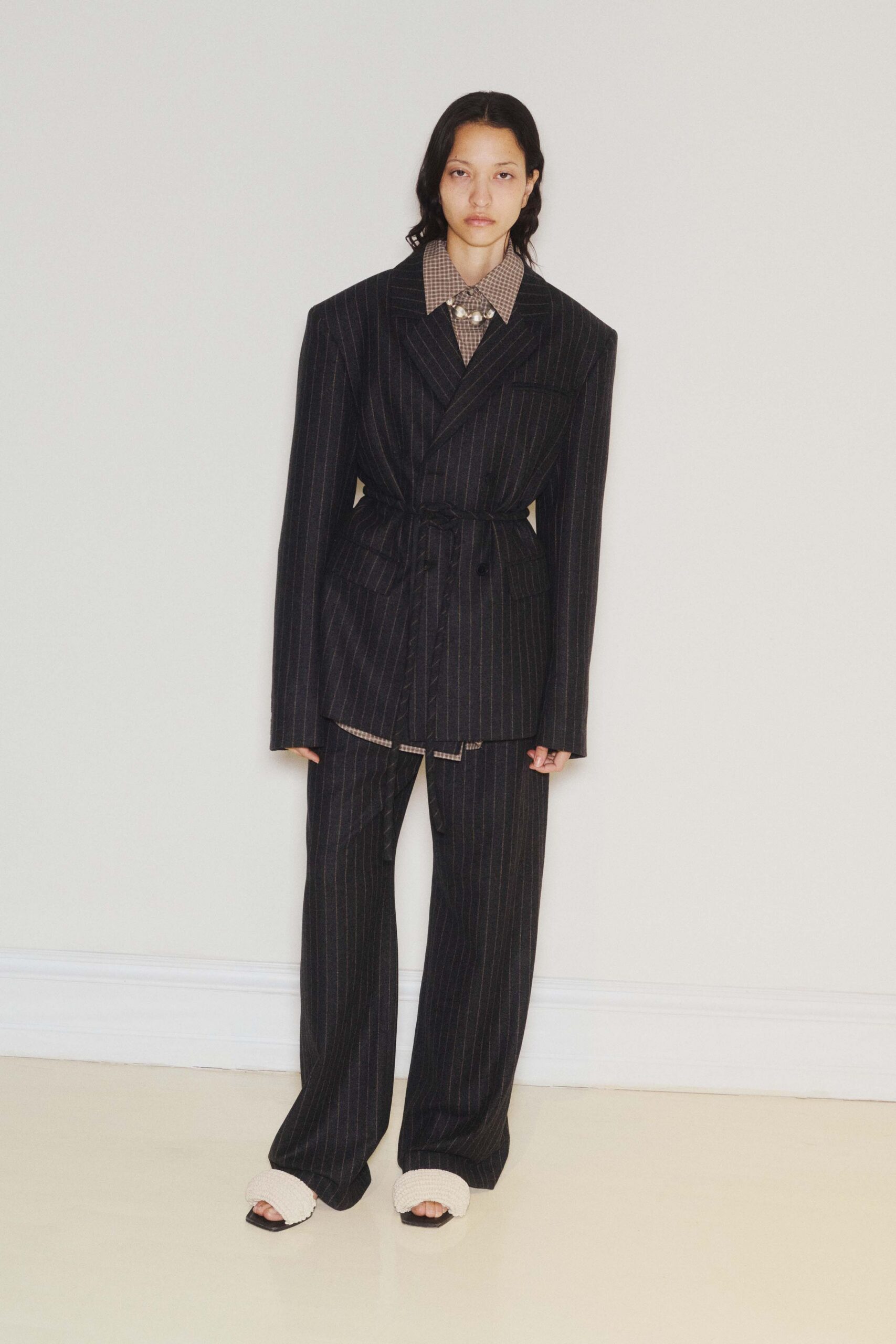 black tailored blazer with checked shirt