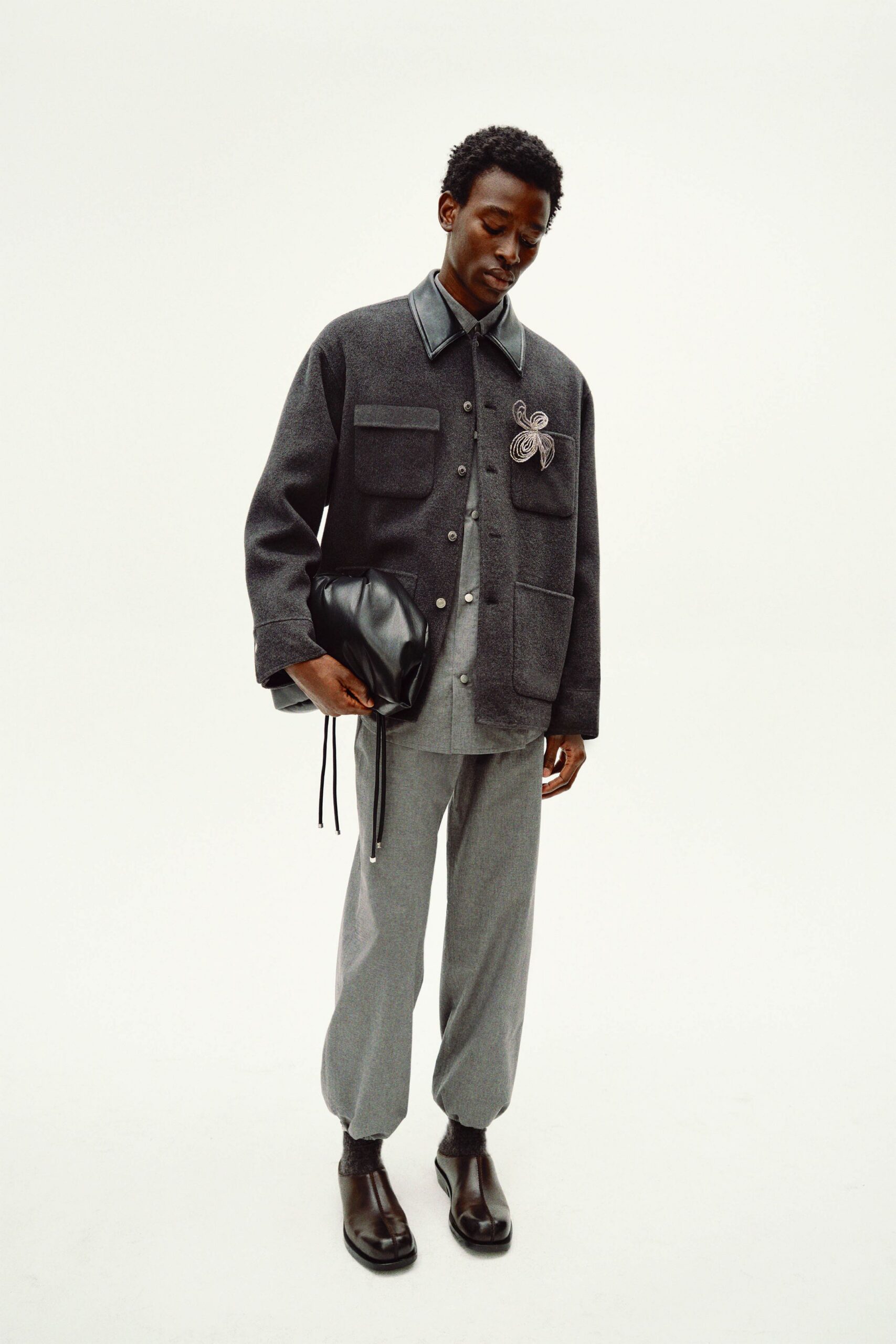 gray wool long-sleeve collared relaxed buttoned jacket