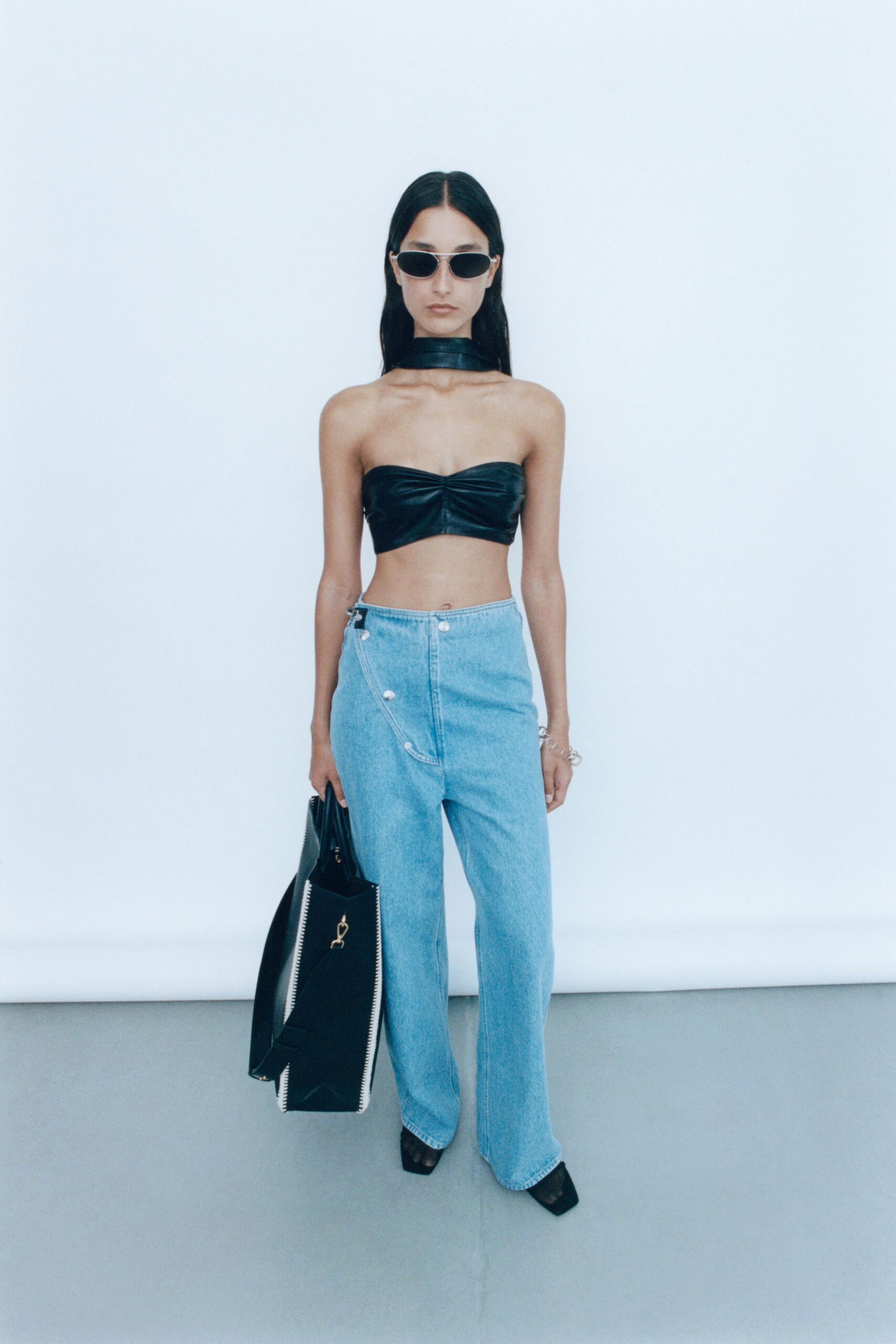 black leather sleeveless strapless fitted ruched crop-top