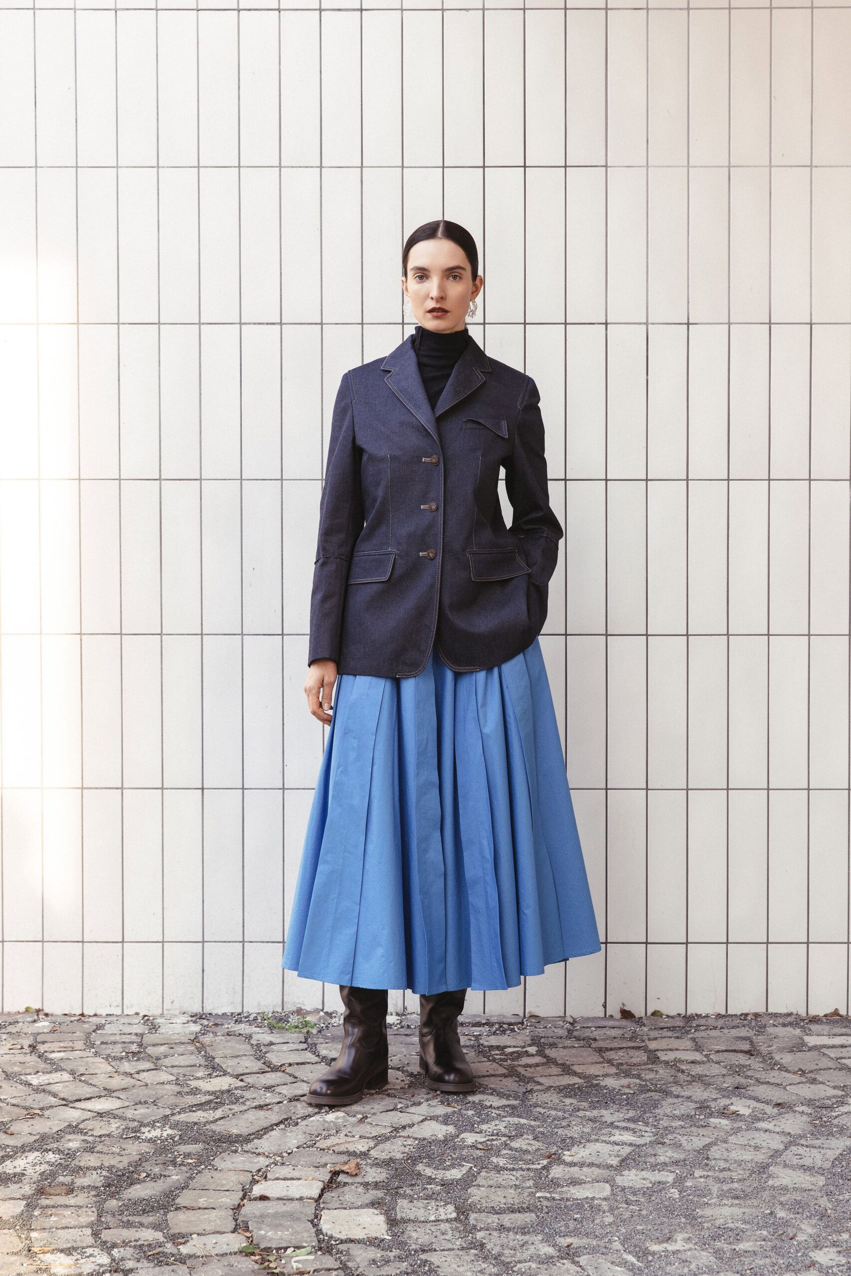 blue blazer and pleated skirt