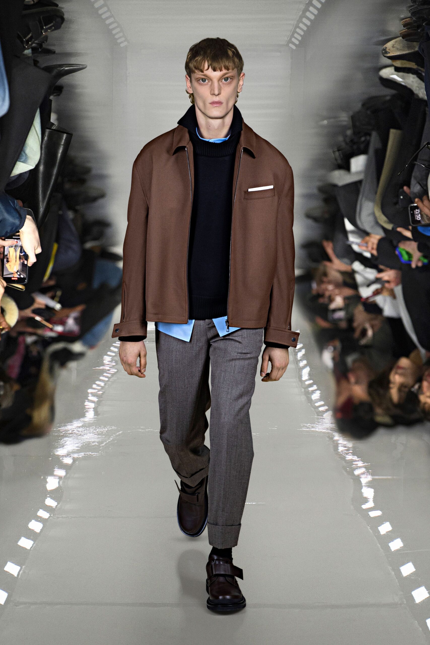 brown jacket navy sweater gray pants