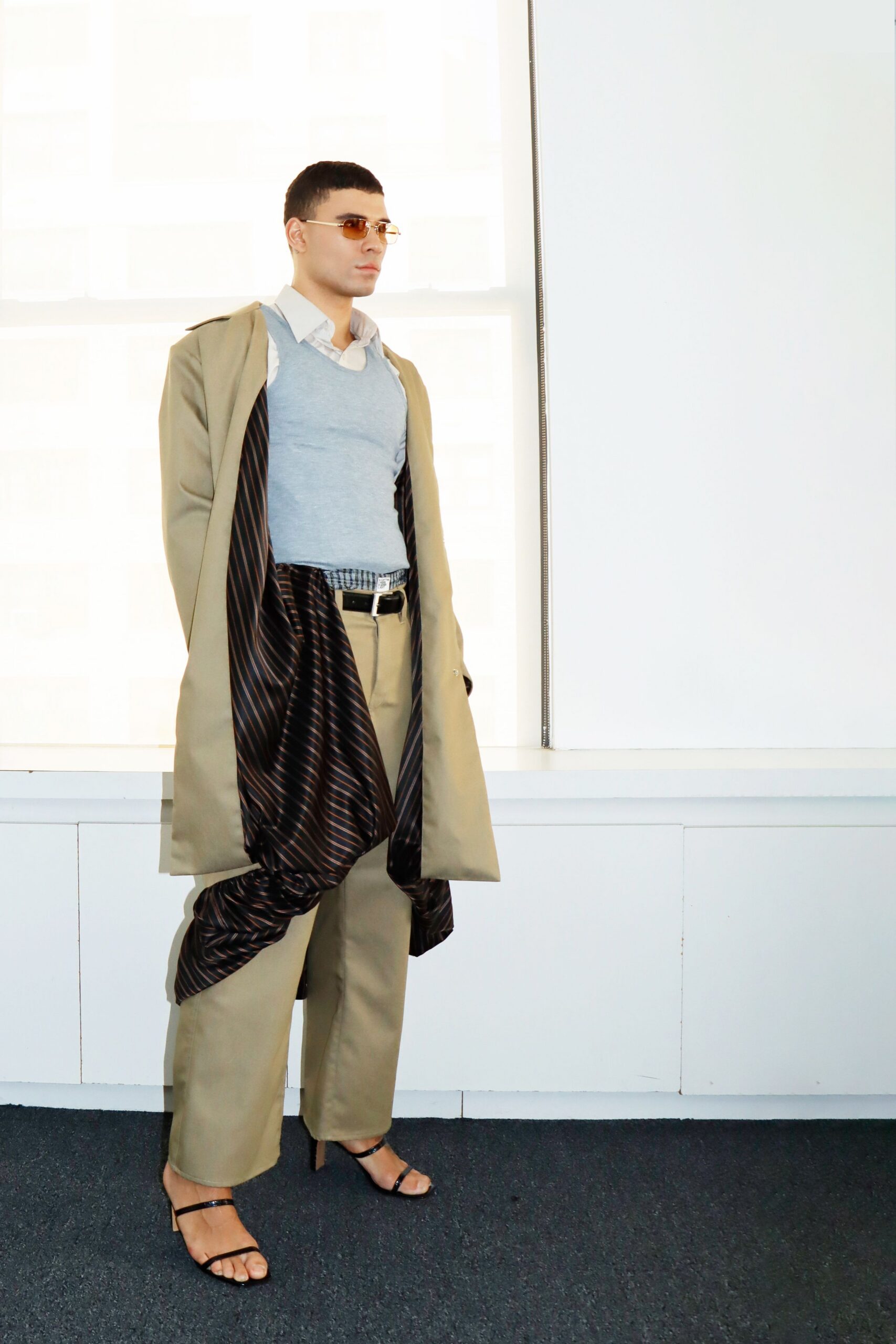 beige coat gray sweater beige pants