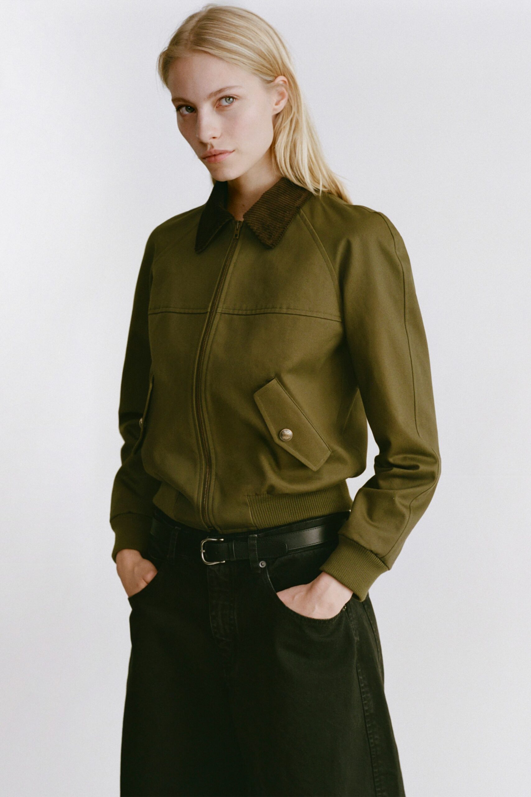 green cotton long-sleeve collared fitted zippered pockets jacket