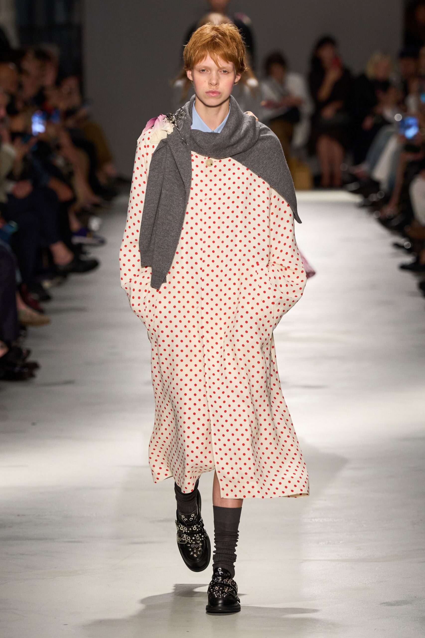 pink polka-dot midi dress with gray sweater