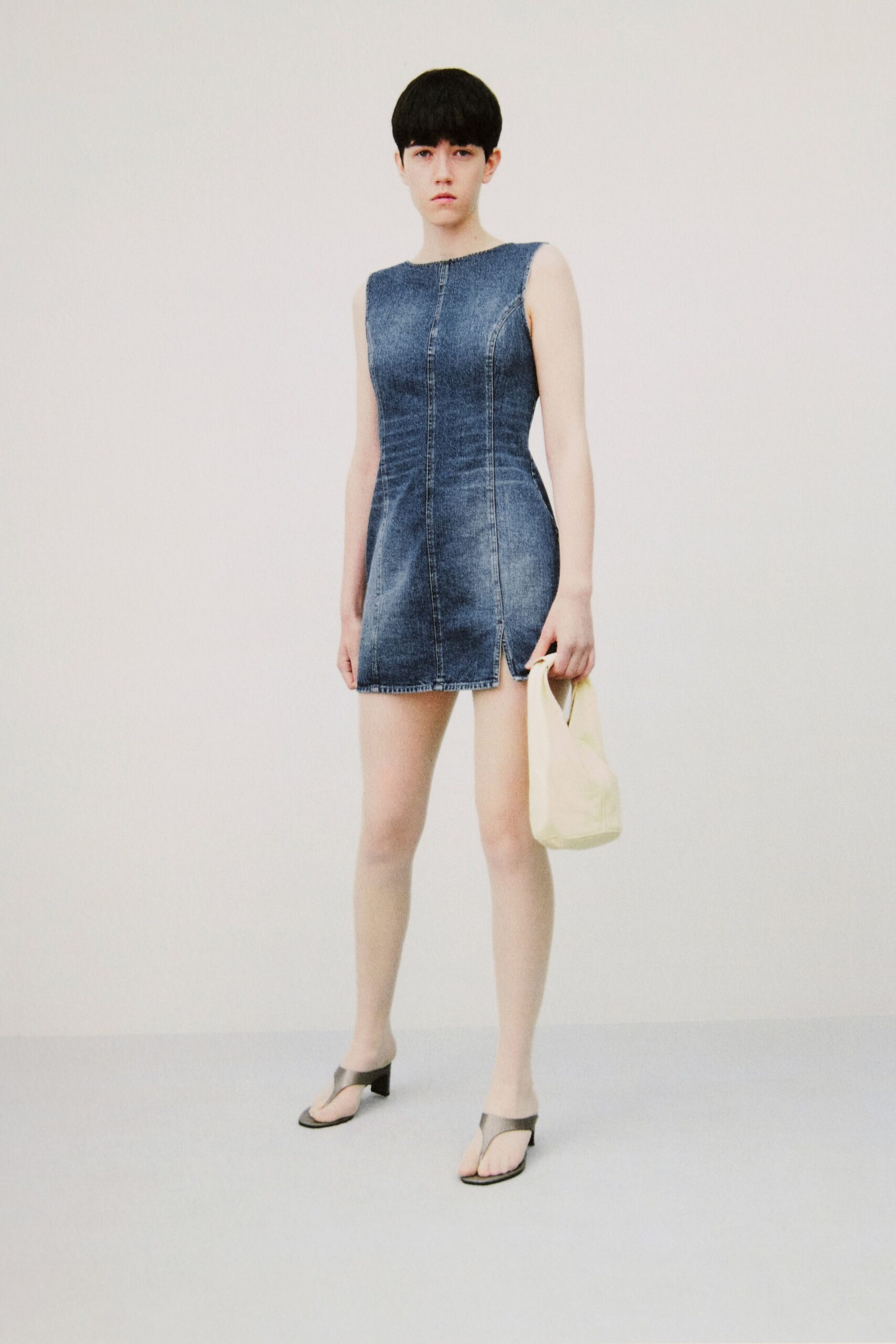 blue denim sleeveless v-neck fitted zippered straight-leg mini-dress