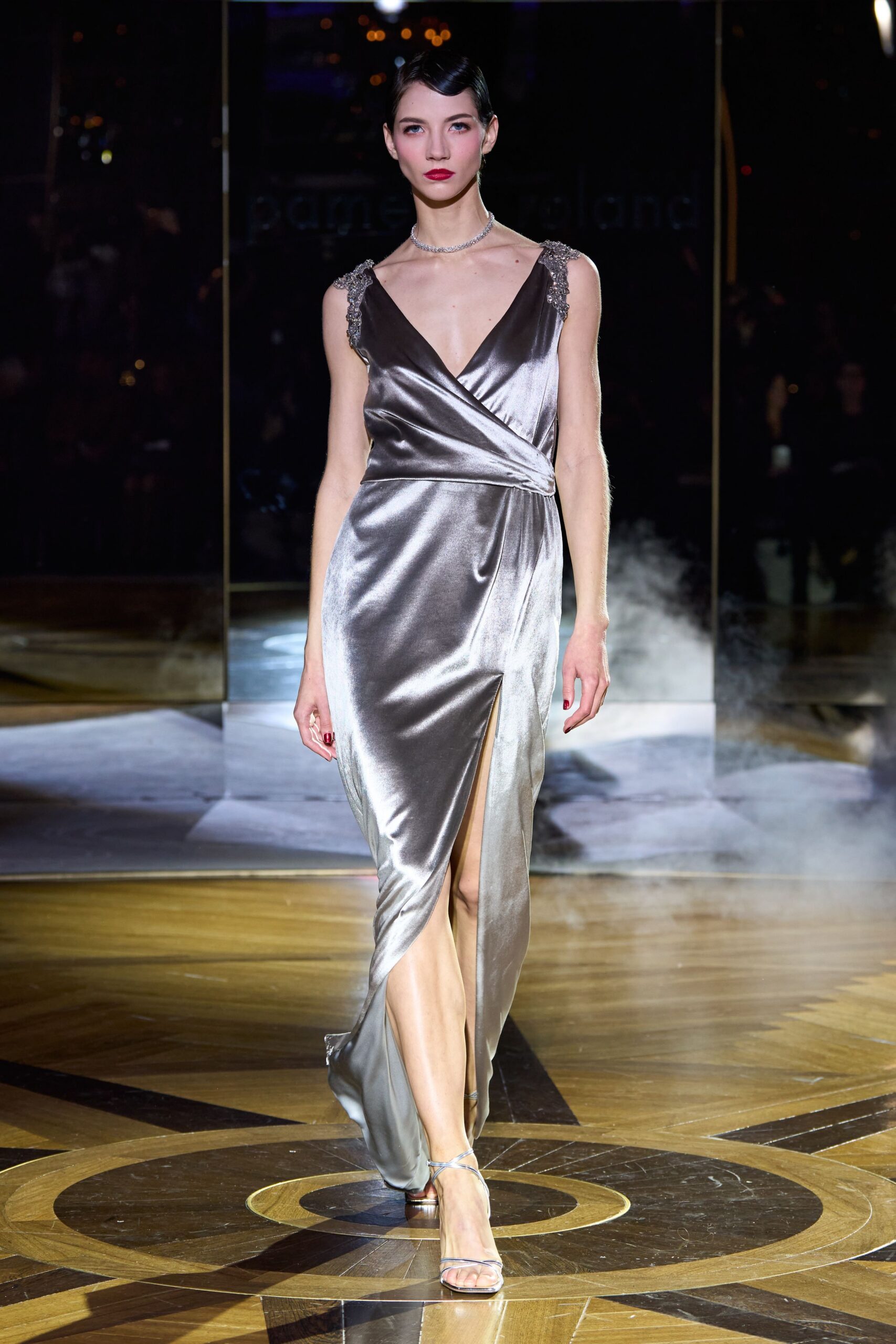 gray silk sleeveless v-neck fitted draped shiny gown