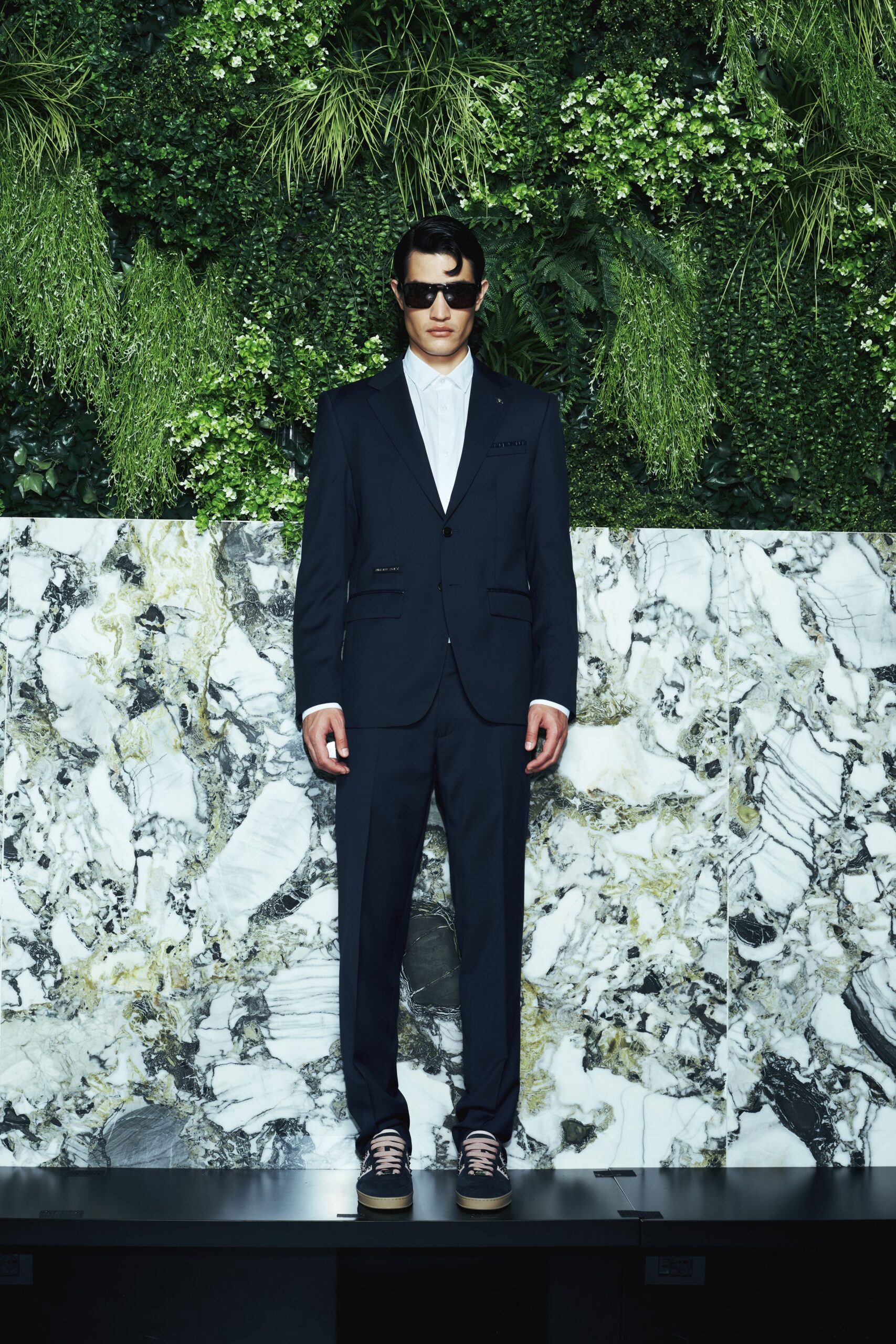 black tailored suit with white shirt