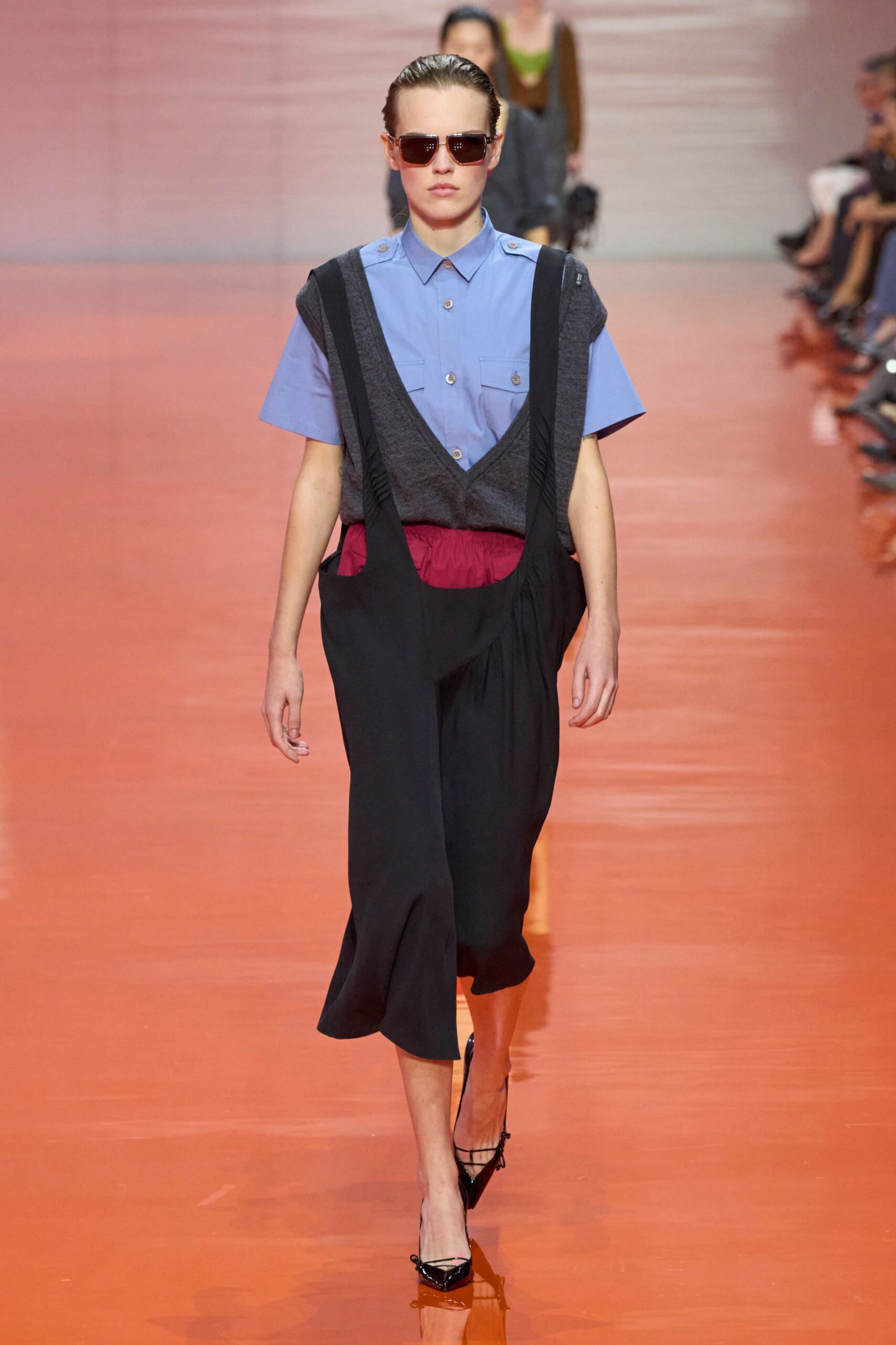 blue shirt layered black dress