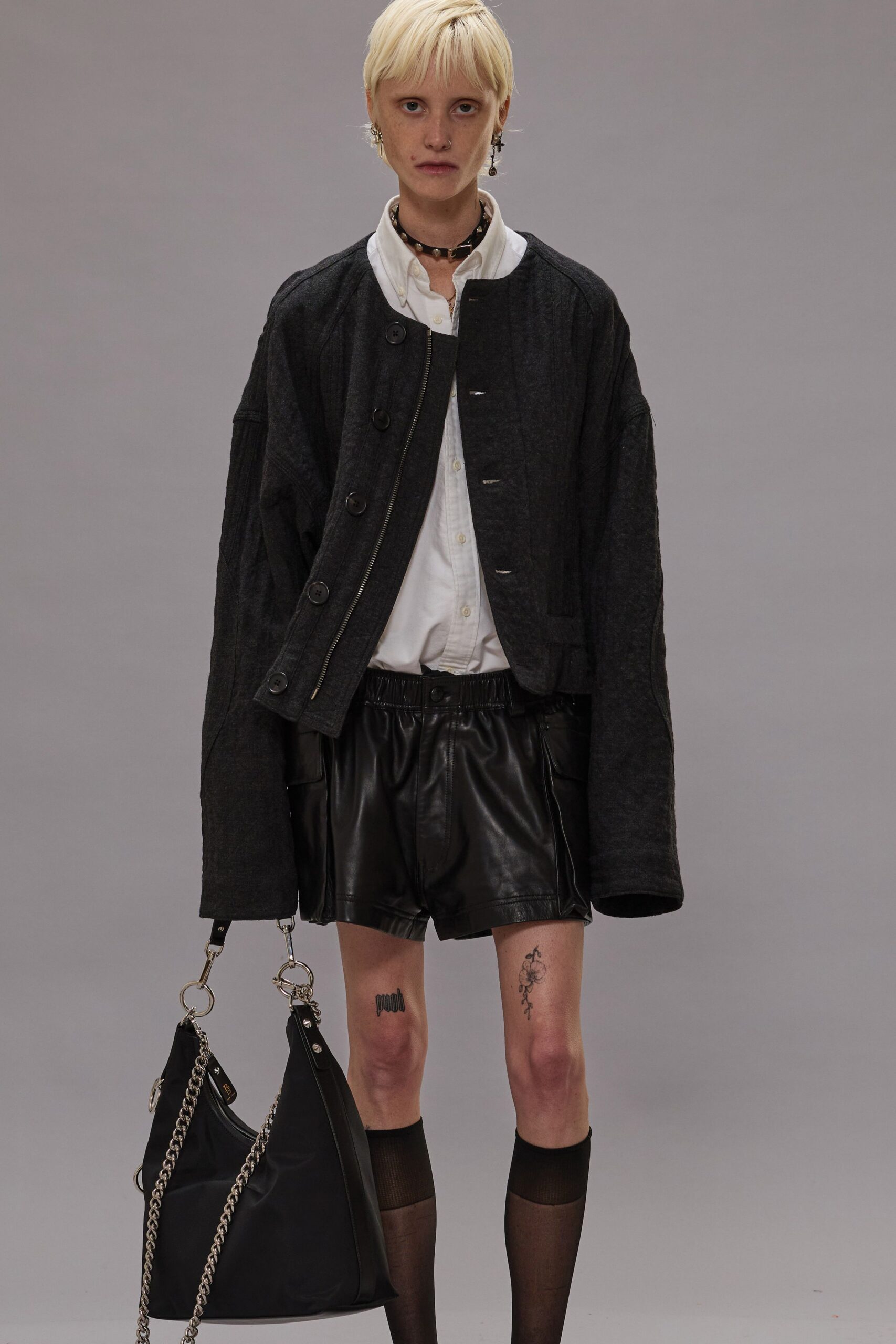 oversized black jacket with leather shorts