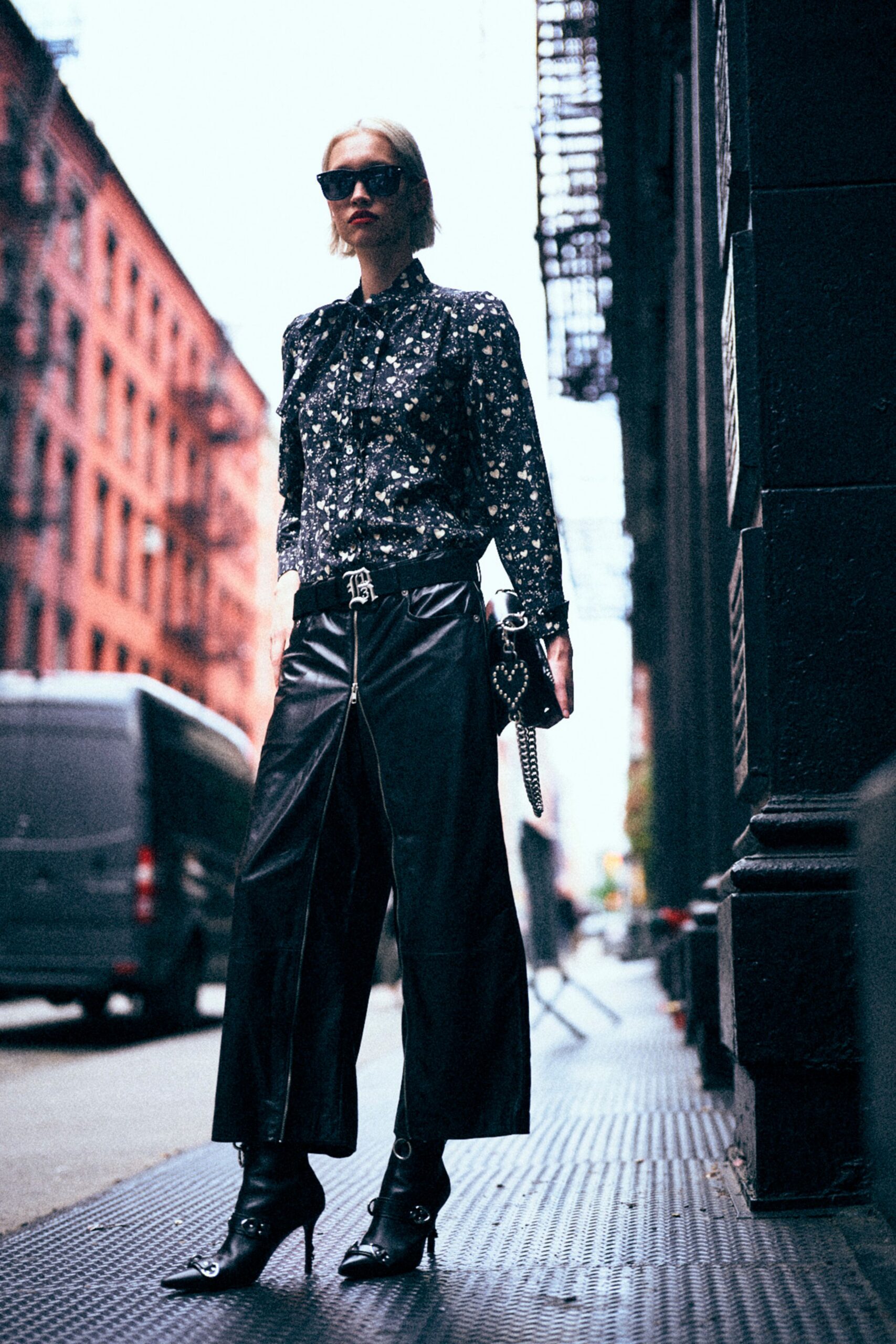 black floral shirt with leather pants