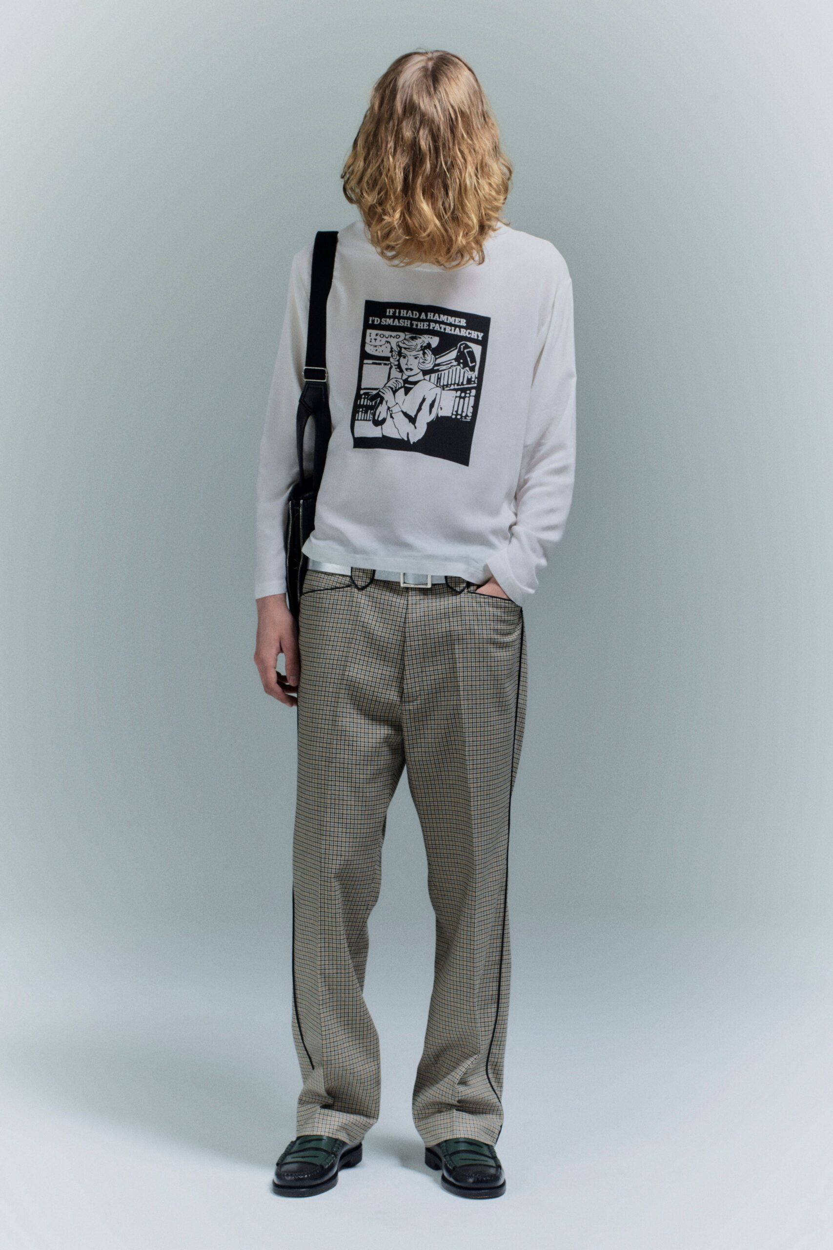 white relaxed shirt with checked pants