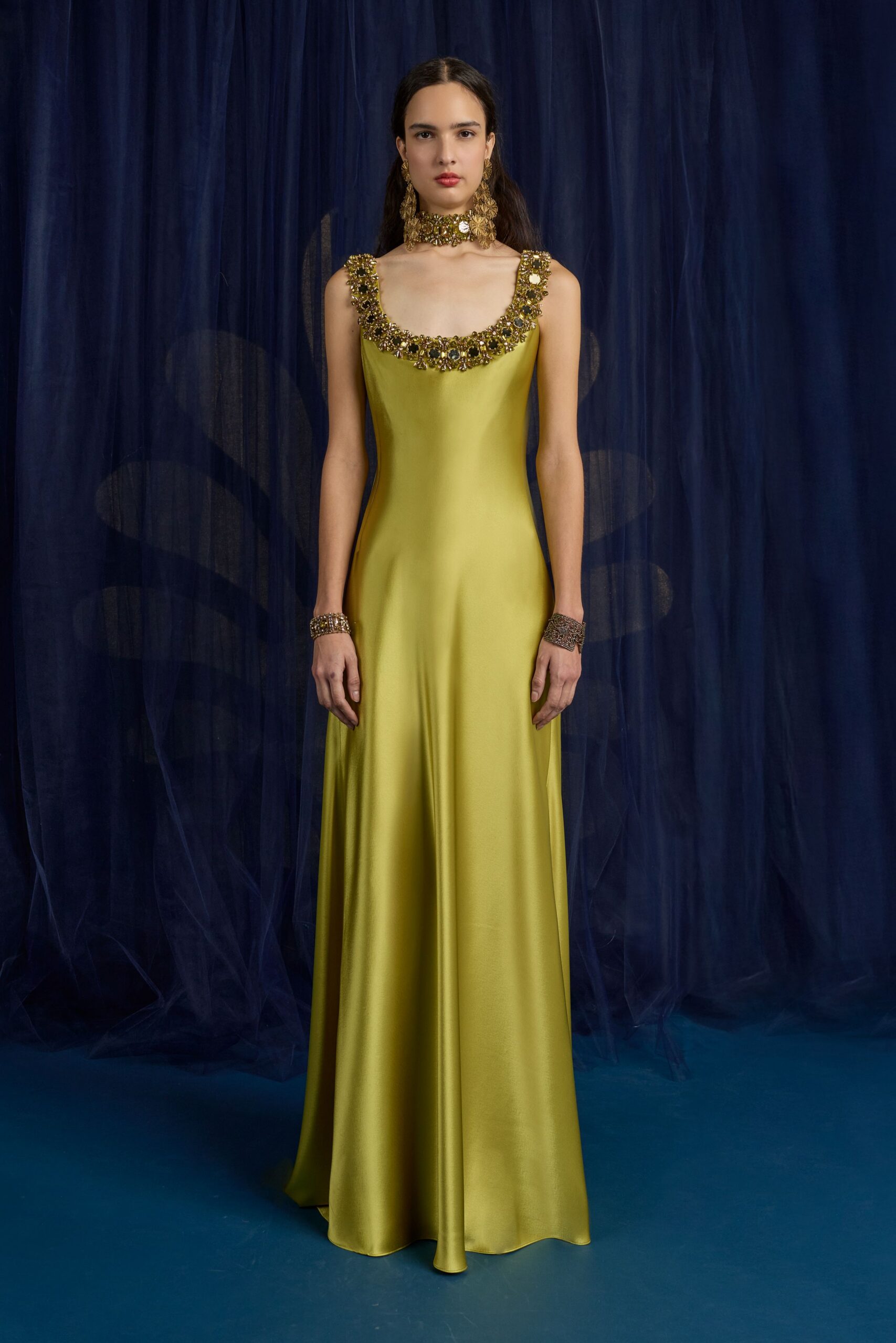 yellow satin sleeveless gown