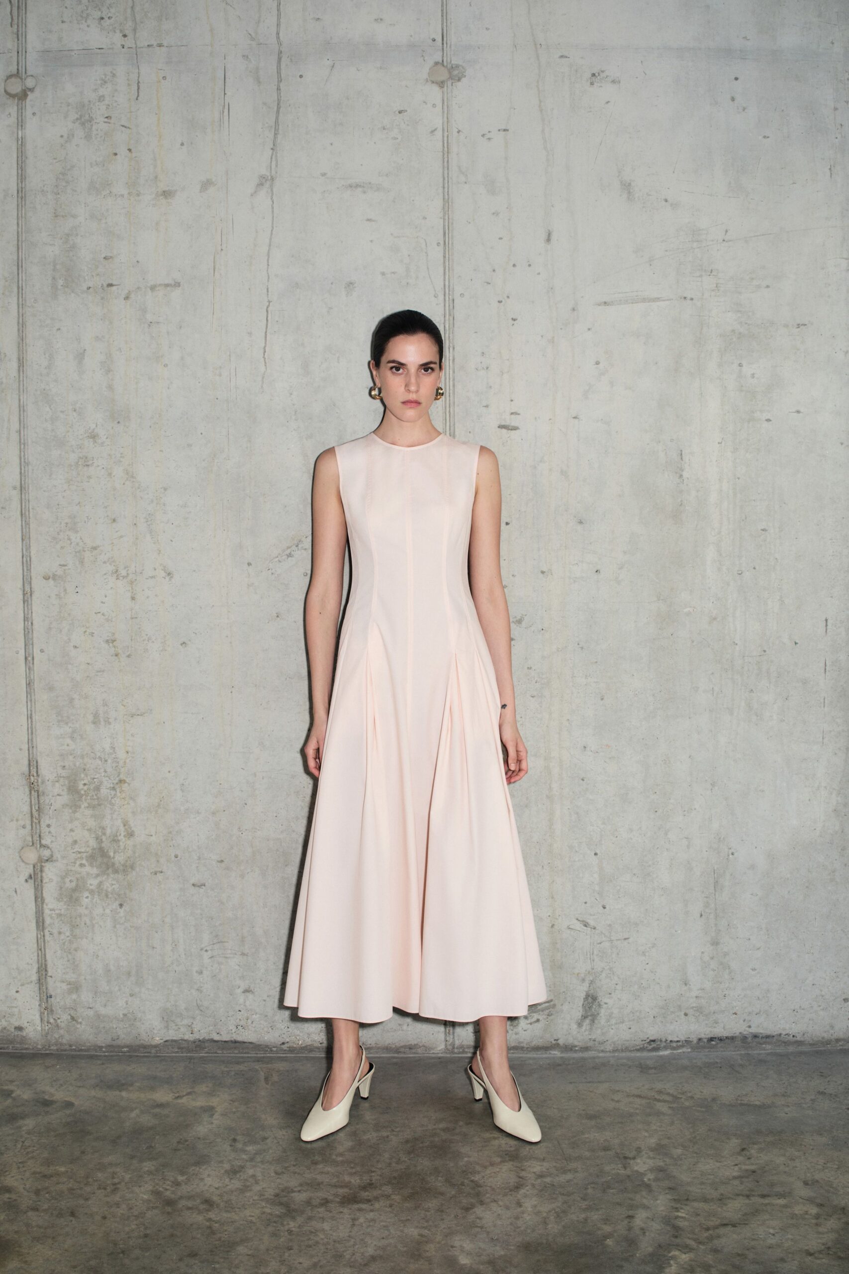 pink cotton sleeveless high-neck fitted pleated a-line dress