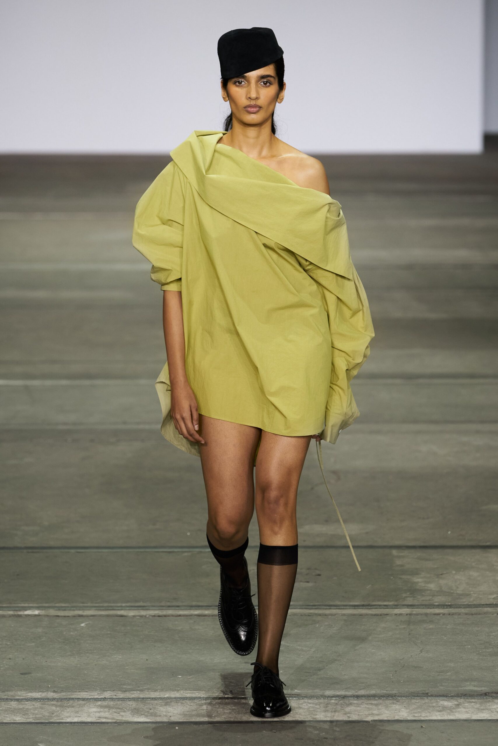 green off-shoulder mini dress