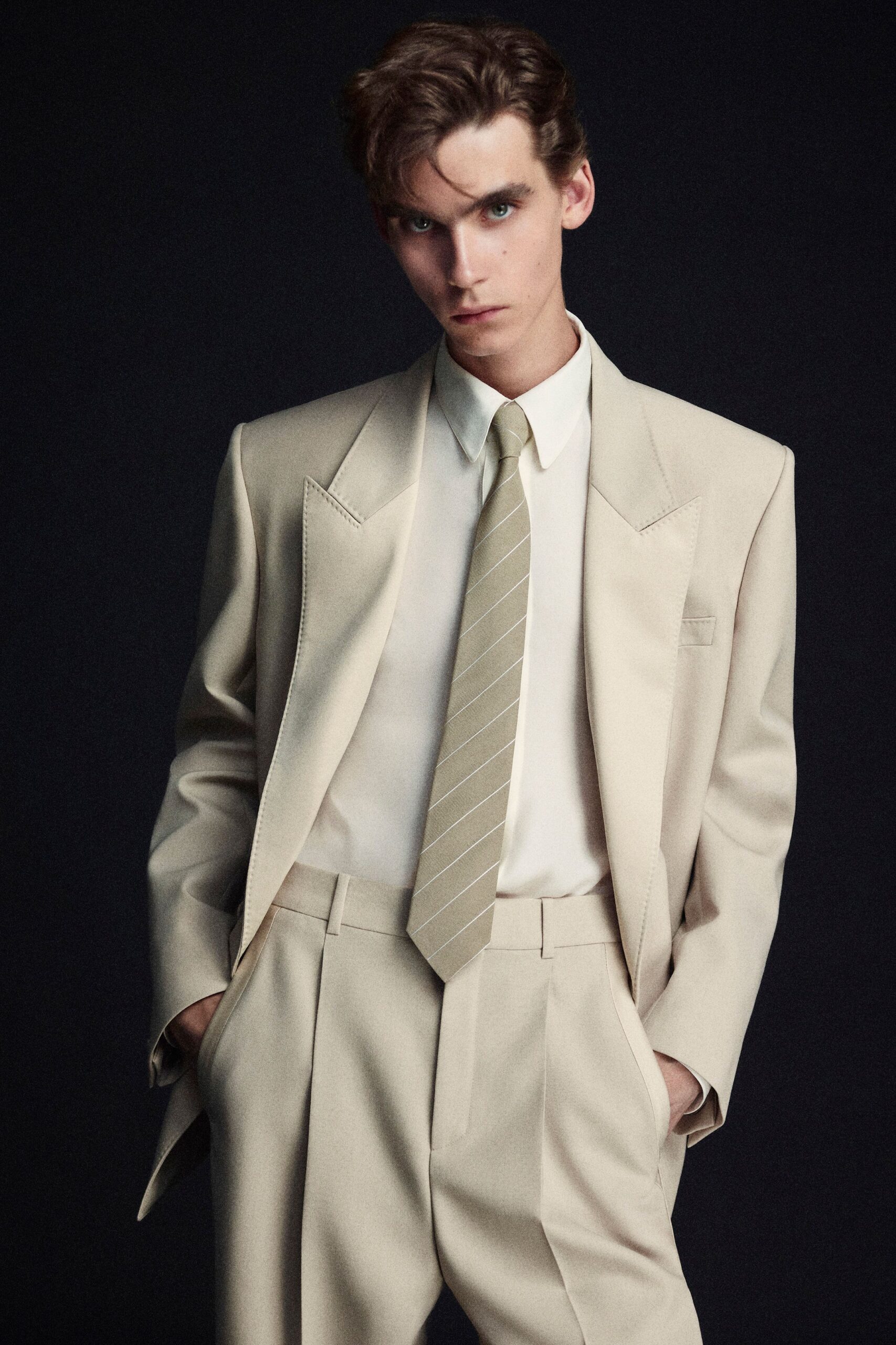 beige long-sleeve collared tailored buttoned suit