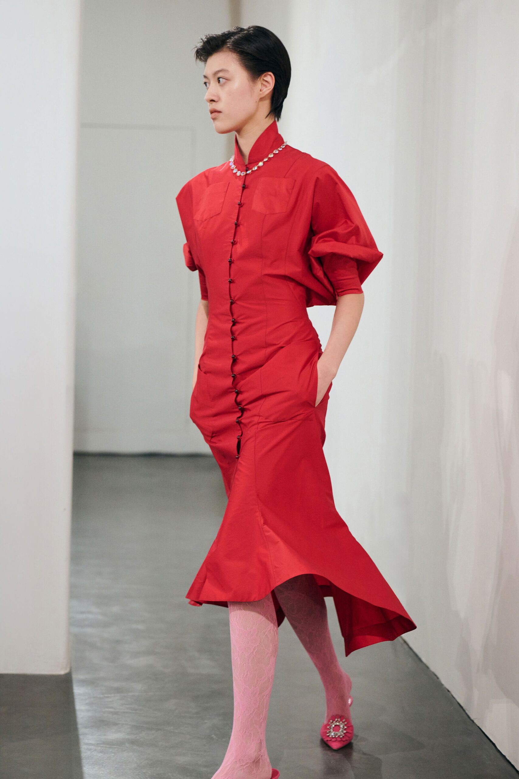 red cotton short-sleeve collared fitted buttoned flared dress