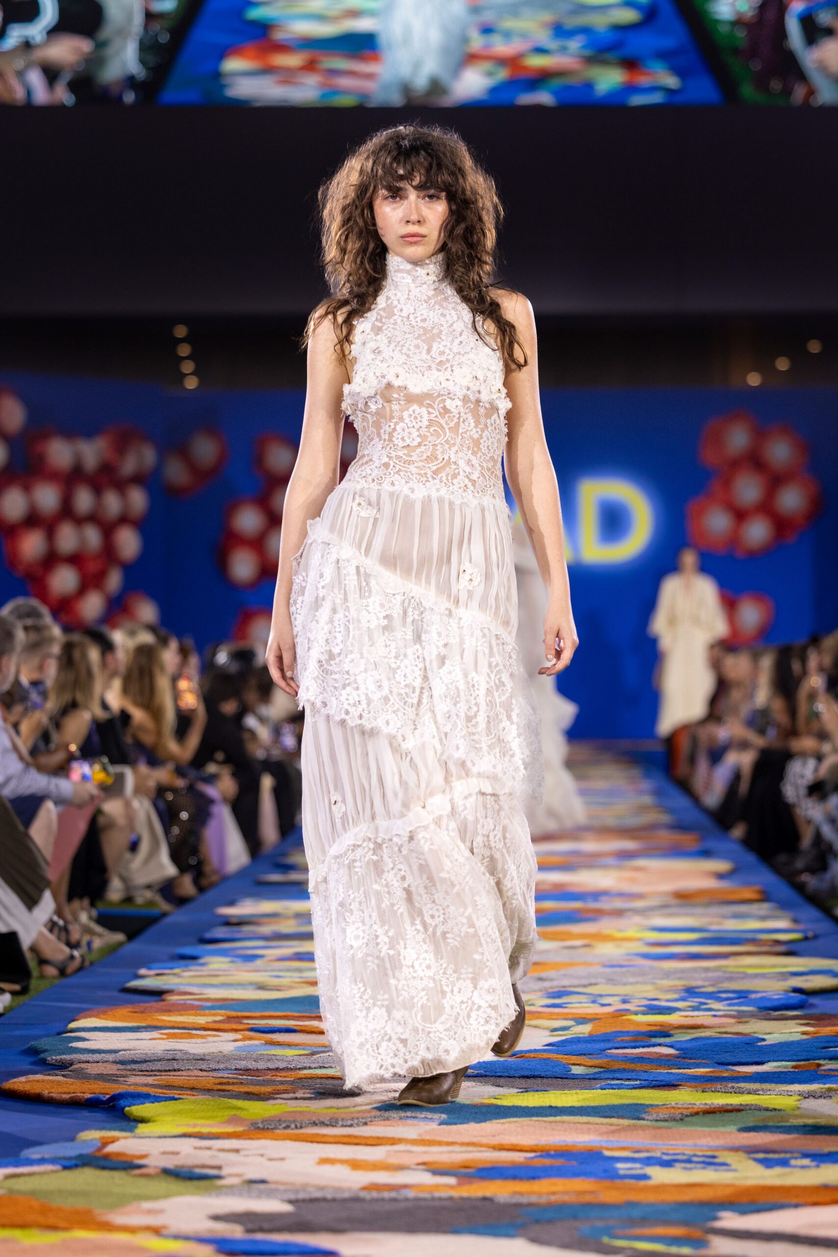 white lace sleeveless gown